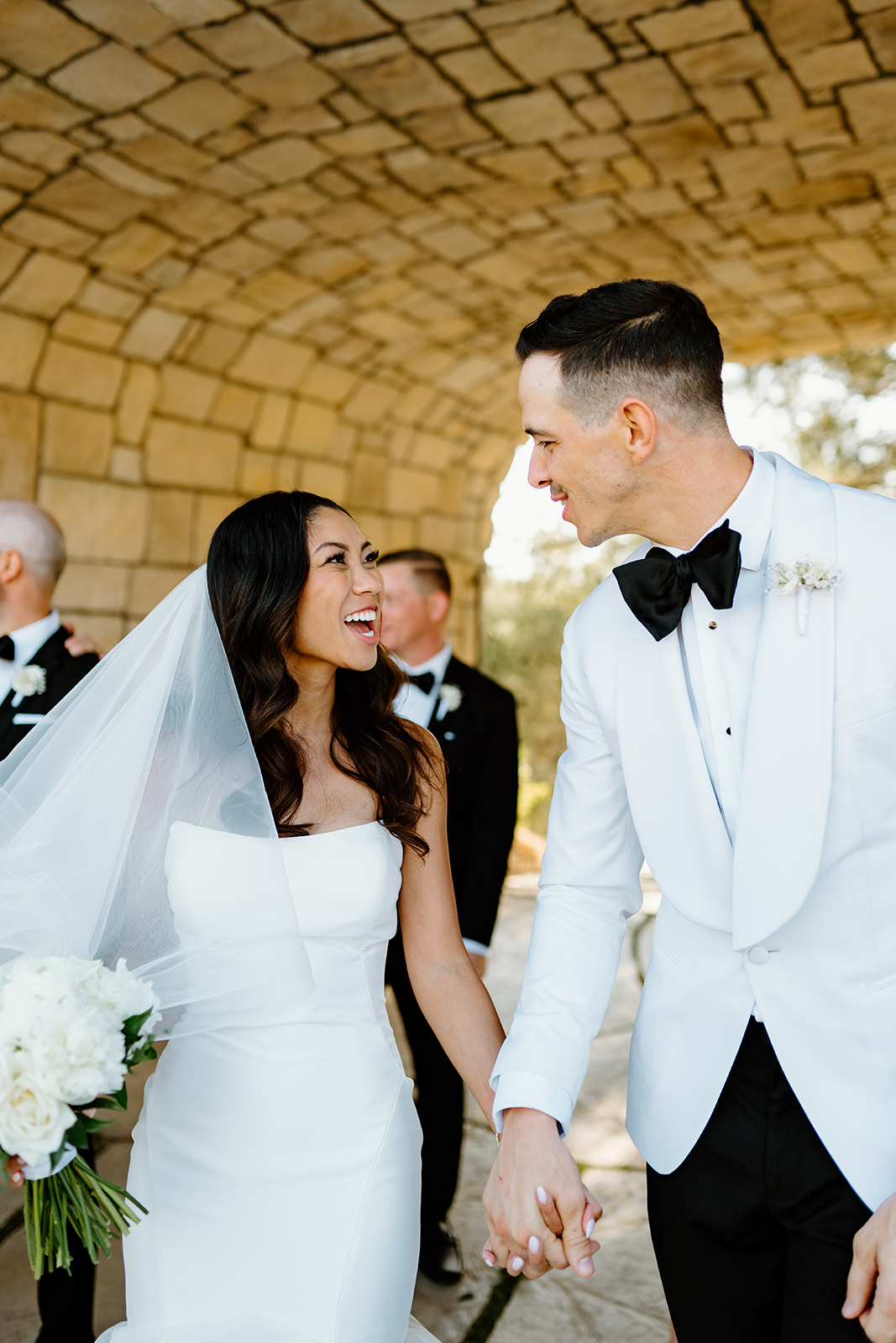 Bride and groom look at eachother at Chateau Noland wedding in San Luis Obispo California - Cobblestone
