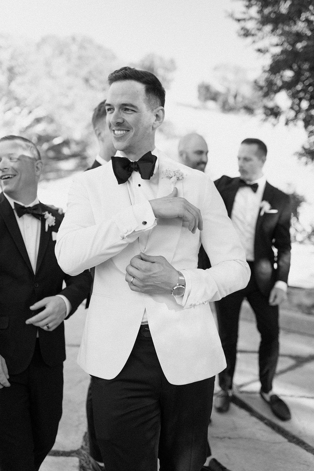 Groom is ready for his wedding in black and white at Chateau Noland wedding in San Luis Obispo California - Cobblestone