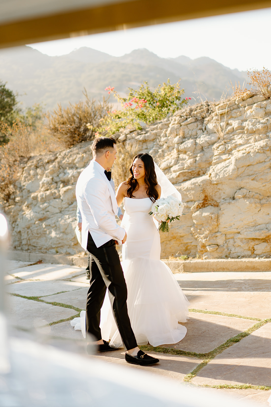 Bride and groom's first steps during wedding at Chateau Noland in San Luis Obispo California - Cobblestone