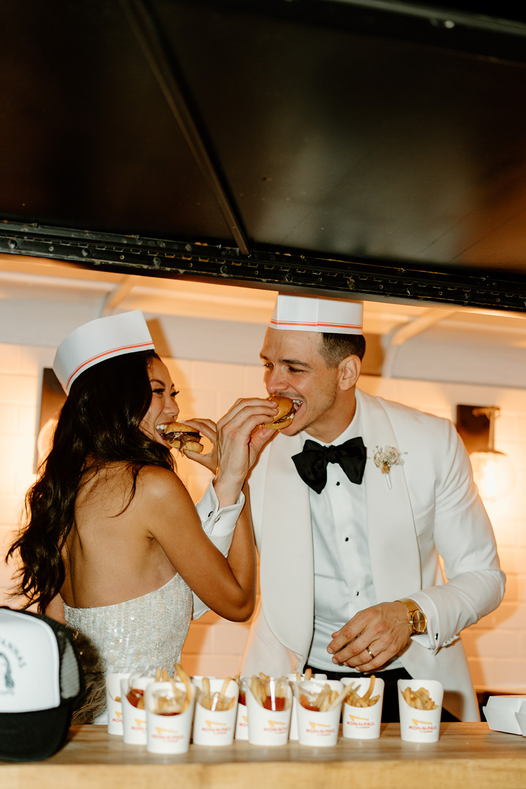 Bride and groom eating in and out at wedding at Chateau Noland San Luis Obispo California - Cobblestone