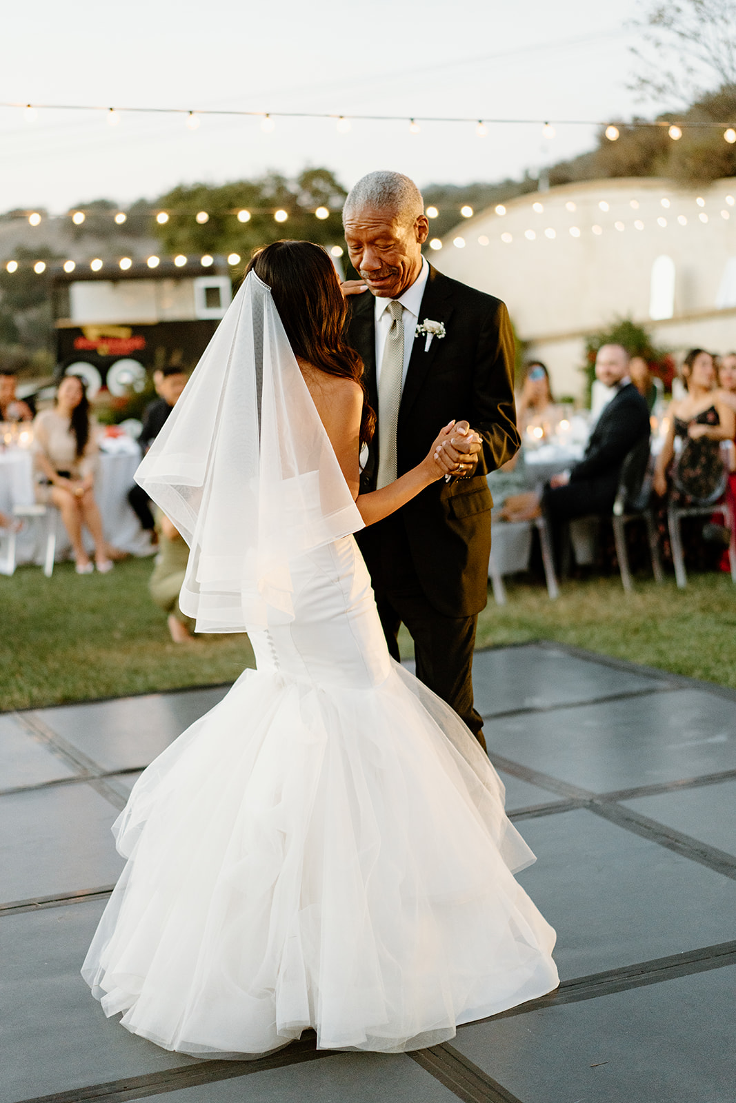 Father daughter dance during Chateau Noland wedding in San Luis Obispo California - Cobblestone