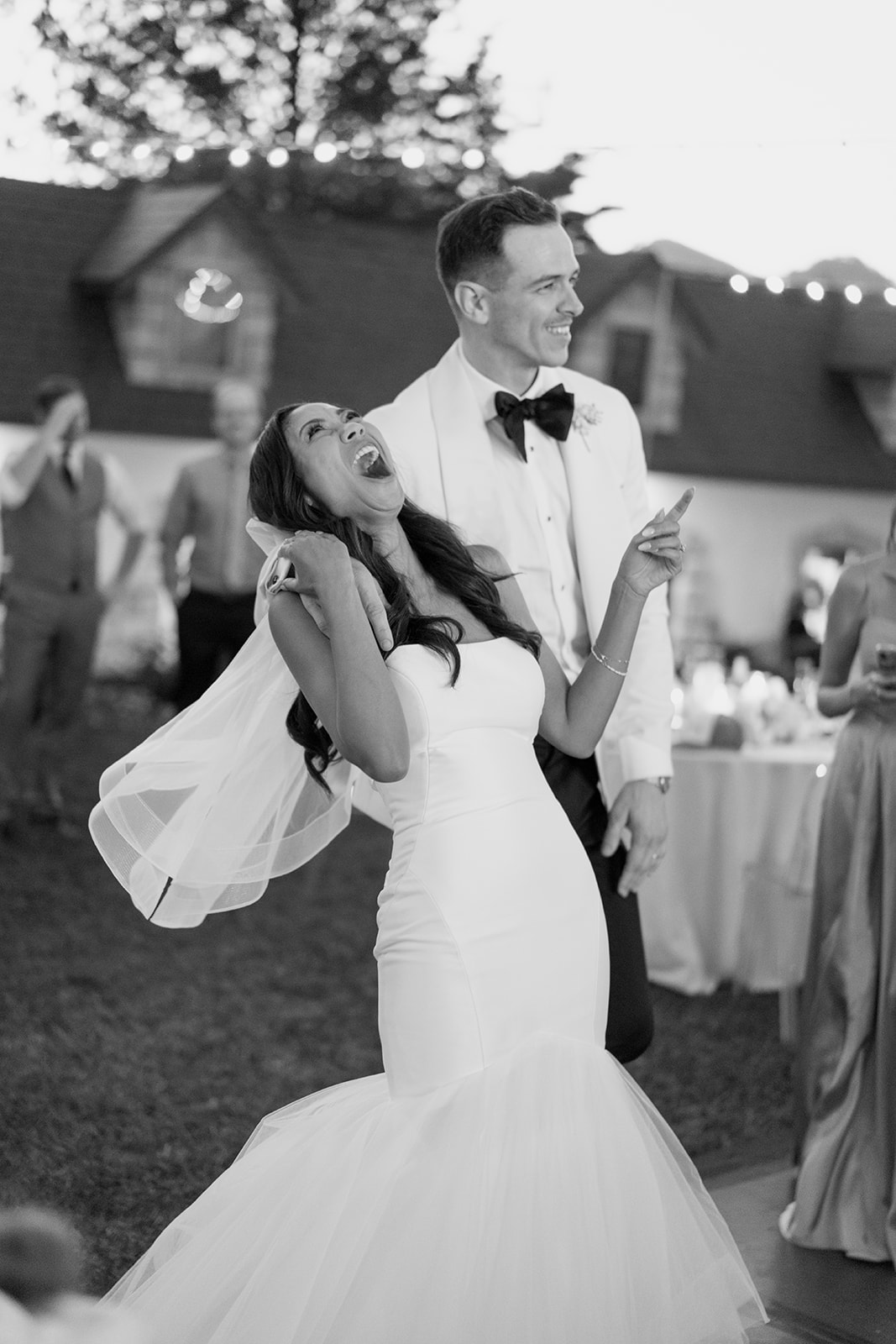 Bride laughing at wedding at Chateau Noland in San Luis Obispo California - Cobblestone