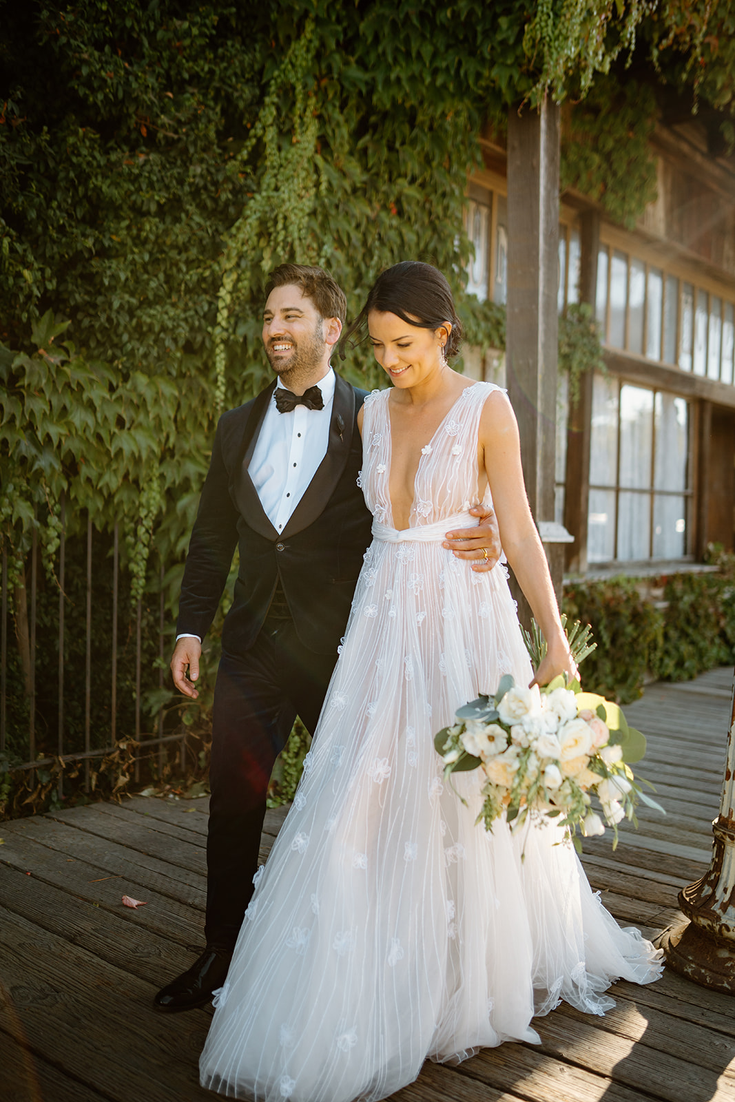 bride and groom outside 1880 Union Hotel in Los Alamos, Ca photography by Cobblestone