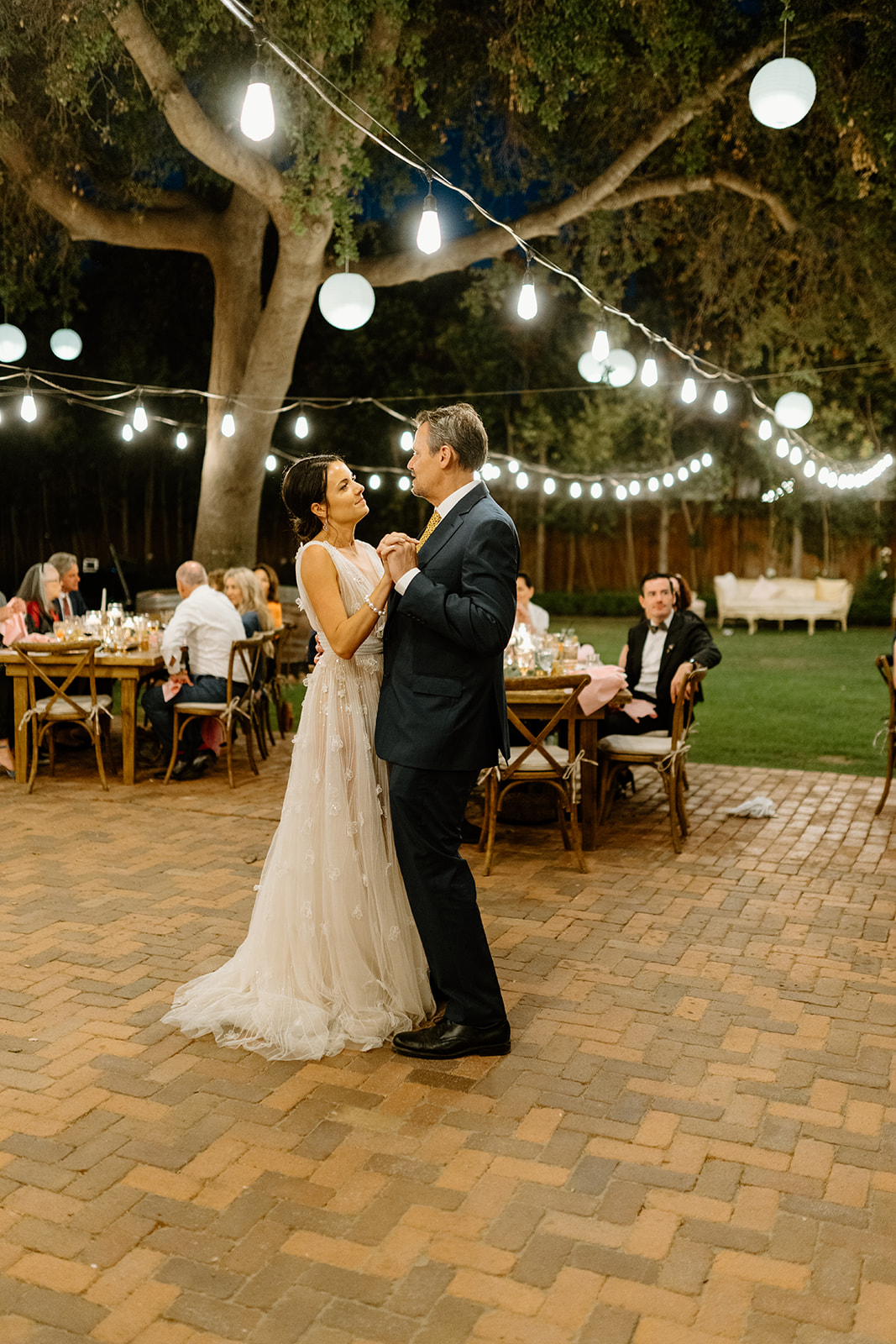 father daughter dance at wedding at 1880 Union Hotel in Los Alamos, Ca photography by Cobblestone