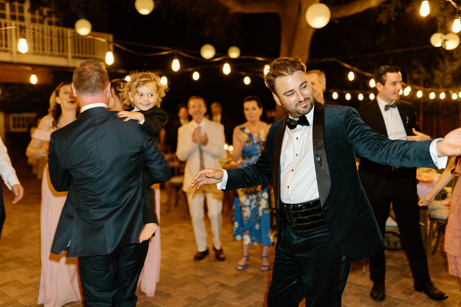 groom dances at wedding at 1880 Union Hotel in Los Alamos, Ca photography by Cobblestone