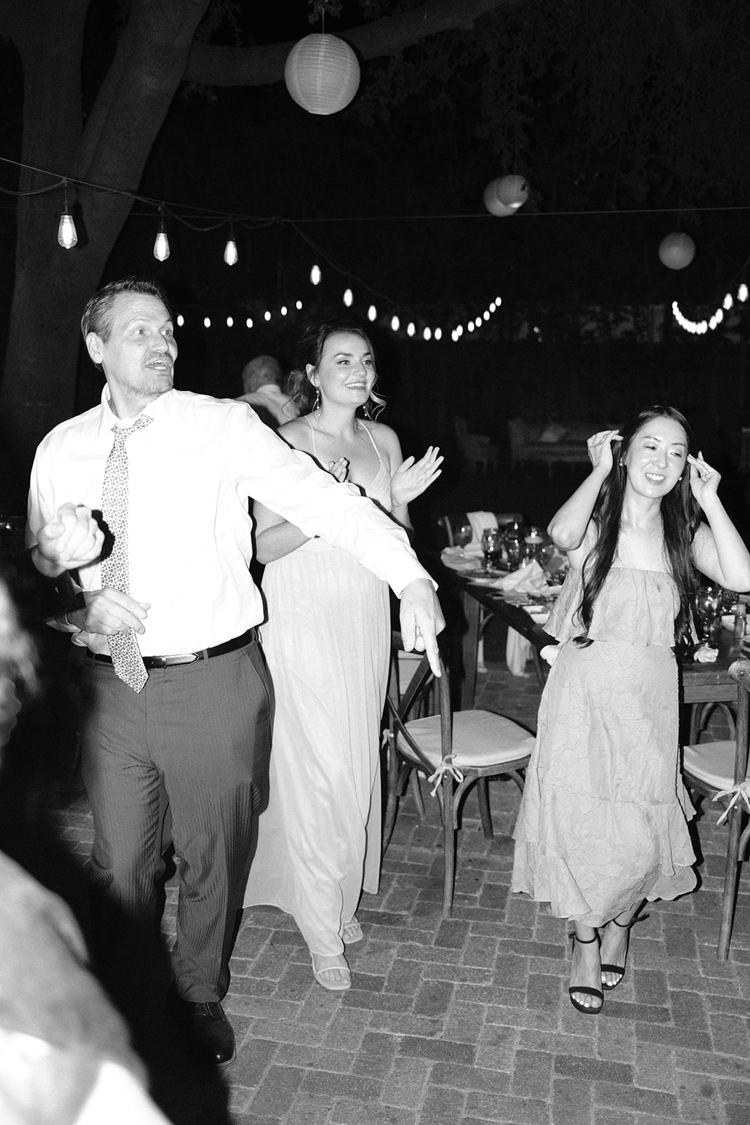 guests dance at wedding at 1880 Union Hotel in Los Alamos, Ca photography by Cobblestone