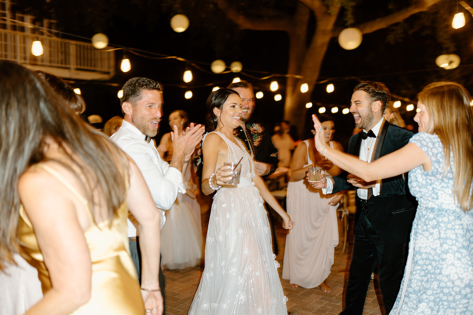 guests dance at wedding at 1880 Union Hotel in Los Alamos, Ca photography by Cobblestone
