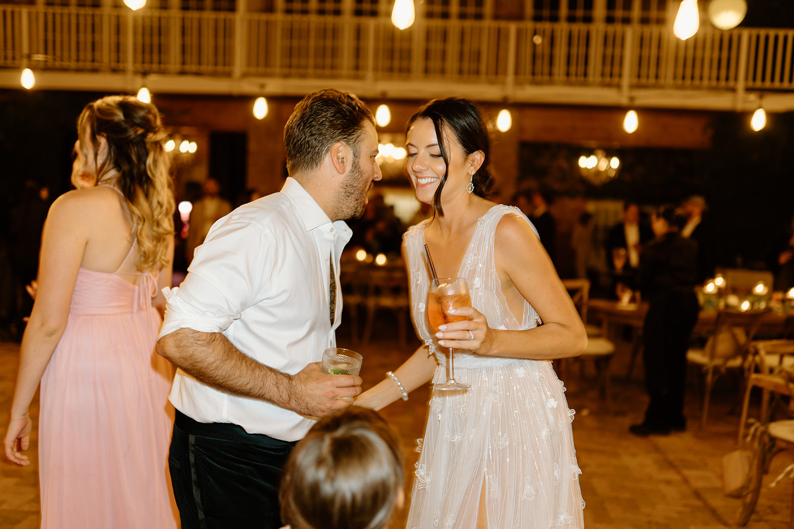 guests dance at wedding at 1880 Union Hotel in Los Alamos, Ca photography by Cobblestone