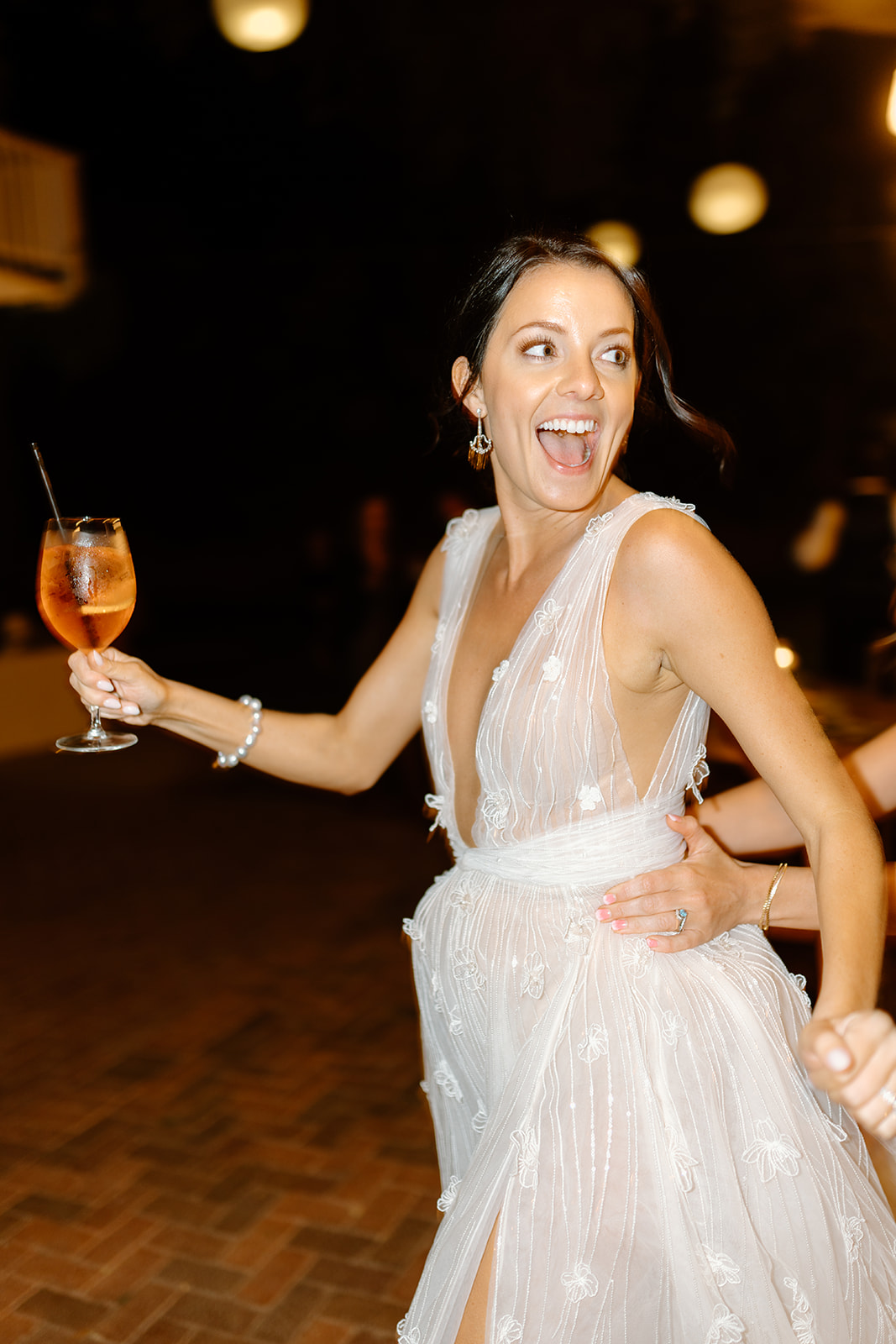 bride dances at wedding at 1880 Union Hotel in Los Alamos, Ca photography by Cobblestone