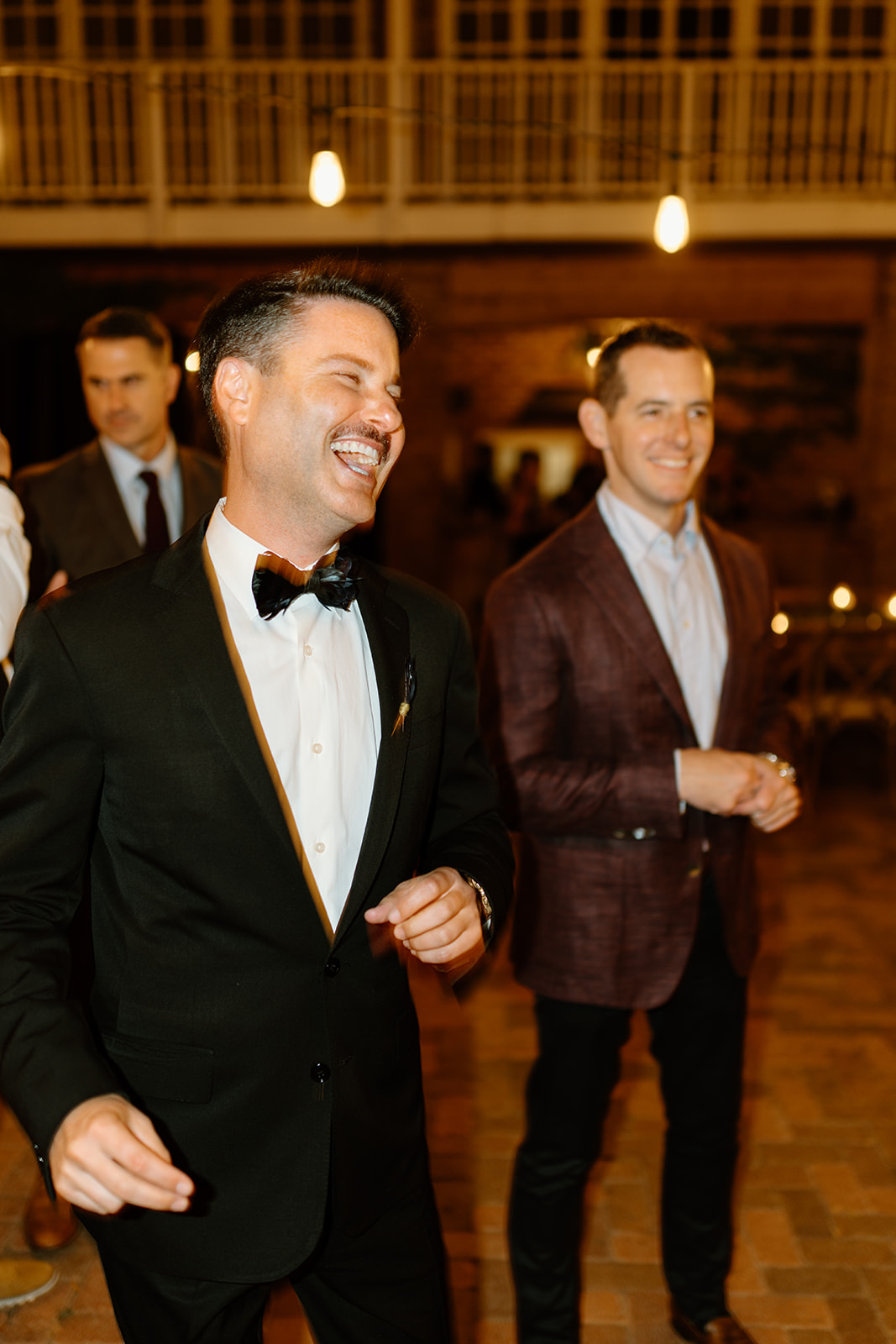 guests dance at wedding at 1880 Union Hotel in Los Alamos, Ca photography by Cobblestone