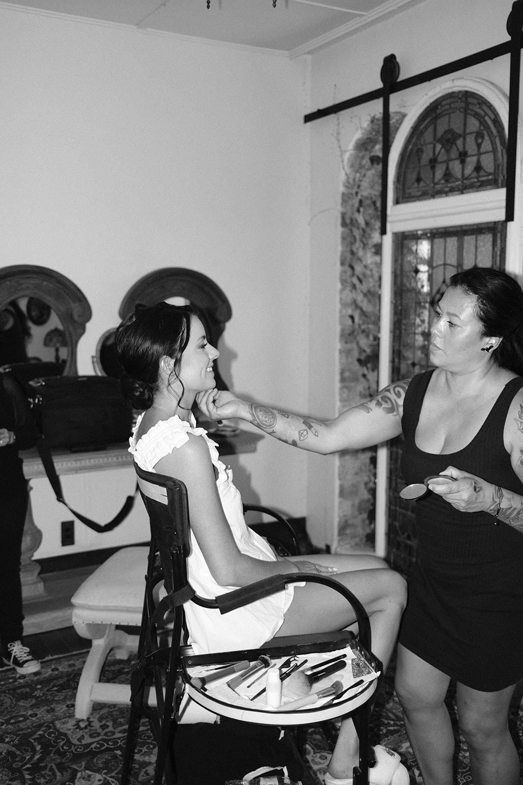 bride gets makeup done at 1880 Union Hotel in Los Alamos, Ca photography by Cobblestone