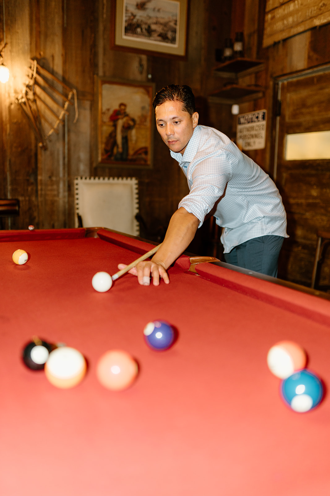 guests play pool at 1880 Union Hotel in Los Alamos, Ca photography by Cobblestone
