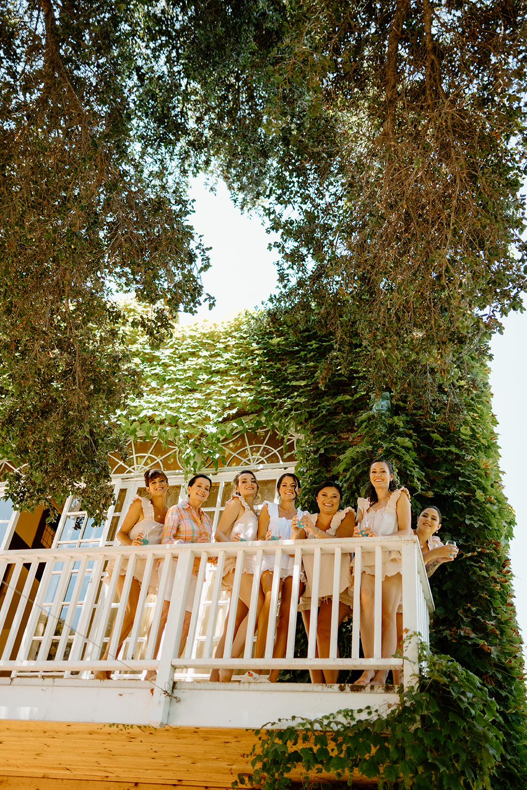 bridesmaids get ready for wedding at 1880 Union Hotel in Los Alamos, Ca photography by Cobblestone