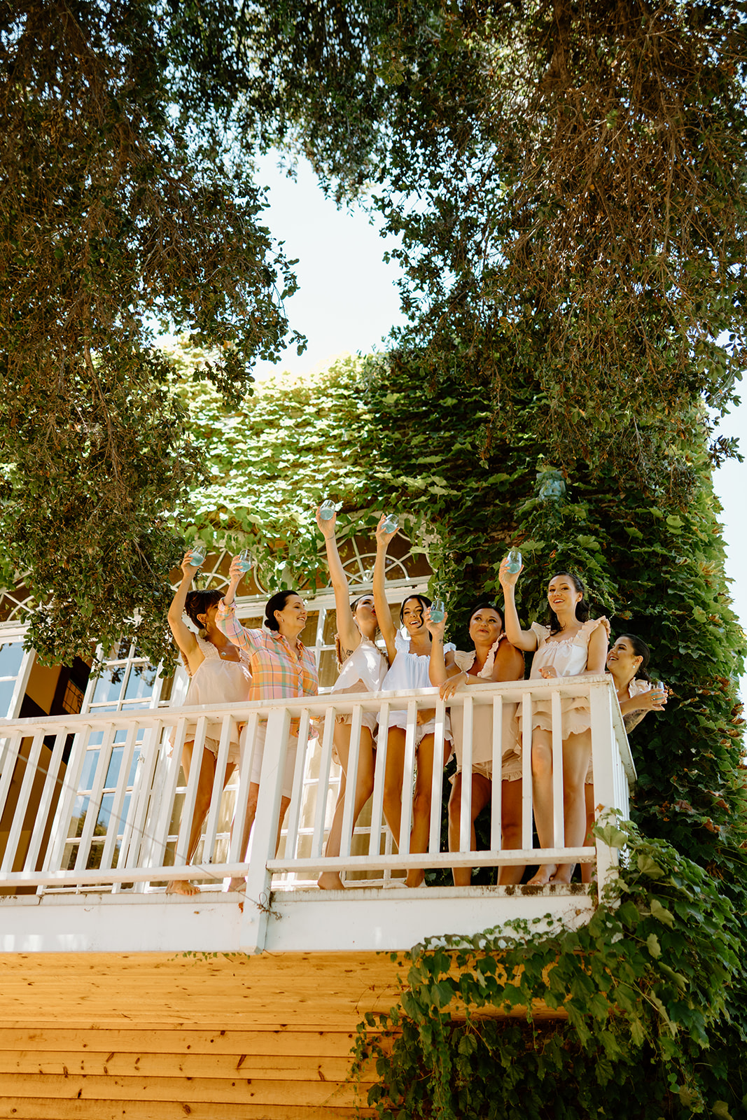 bridesmaids get ready for wedding at 1880 Union Hotel in Los Alamos, Ca photography by Cobblestone