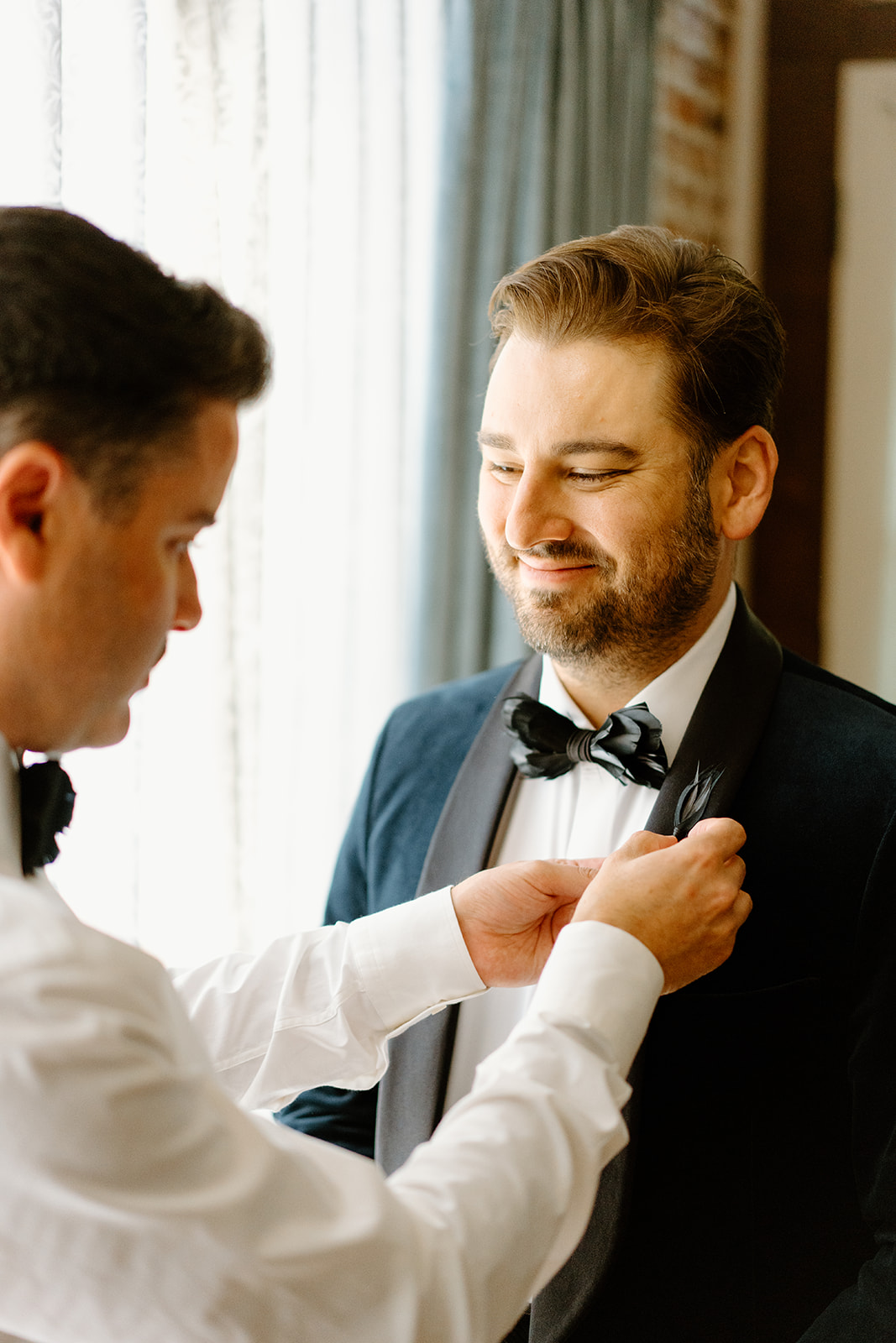 groomsmen get ready for wedding at 1880 Union Hotel in Los Alamos, Ca photography by Cobblestone