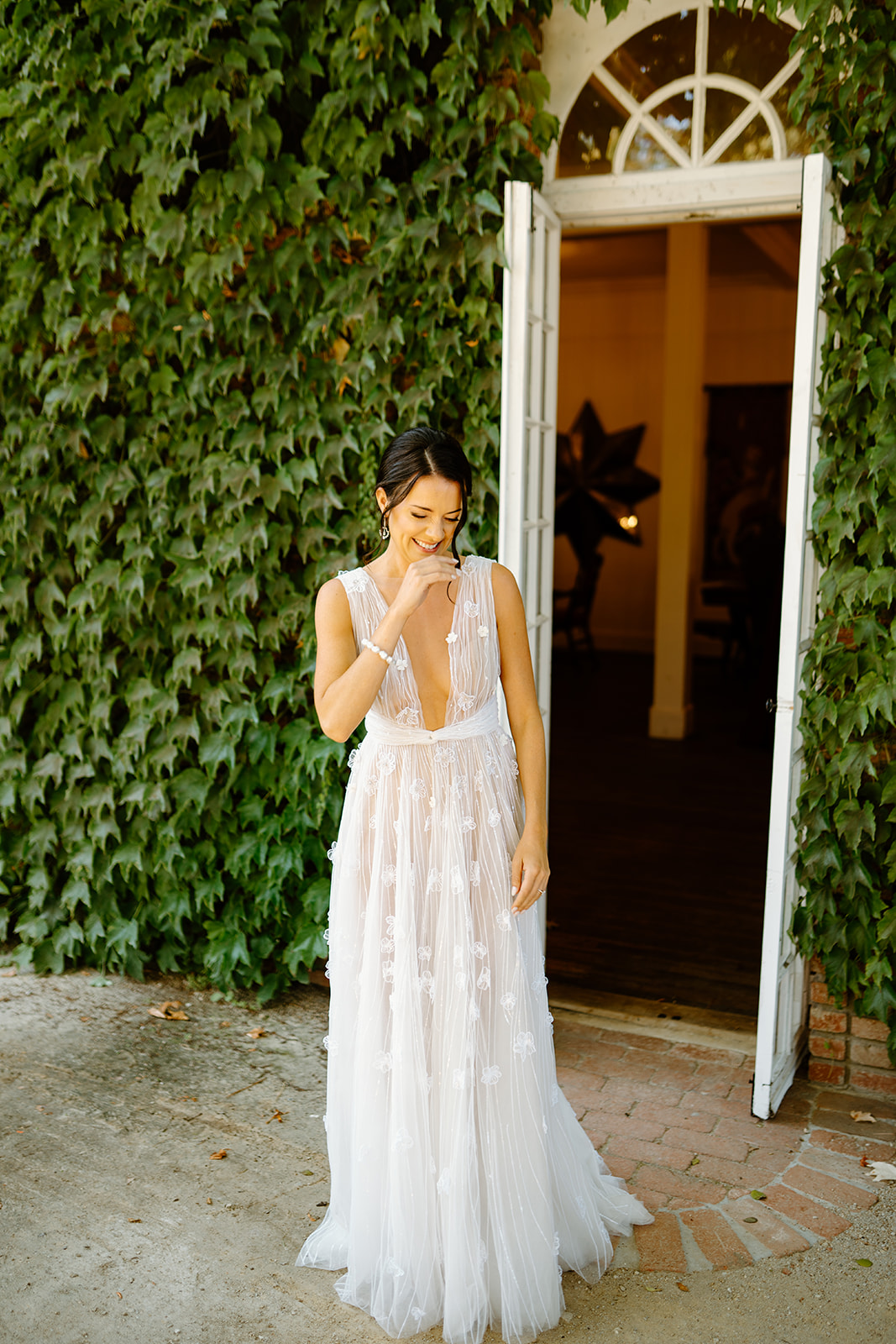 bride and groom first look at wedding at 1880 Union Hotel in Los Alamos, Ca photography by Cobblestone