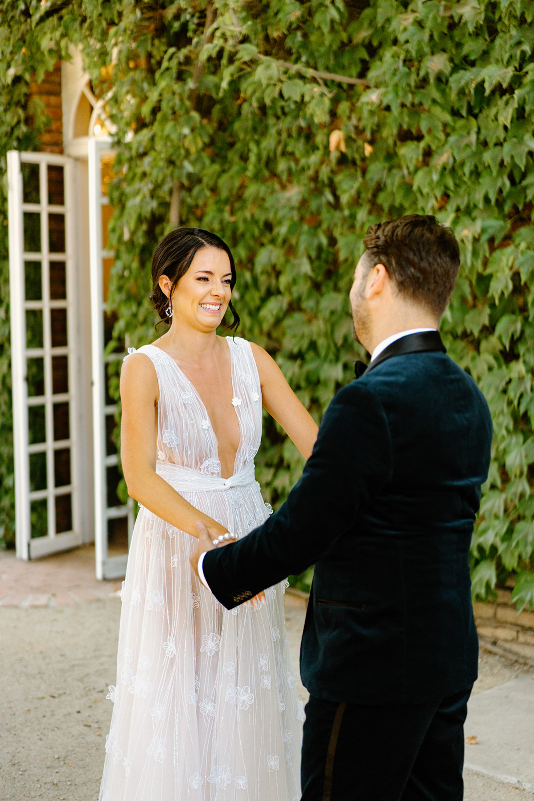 bride and groom first look at wedding at 1880 Union Hotel in Los Alamos, Ca photography by Cobblestone
