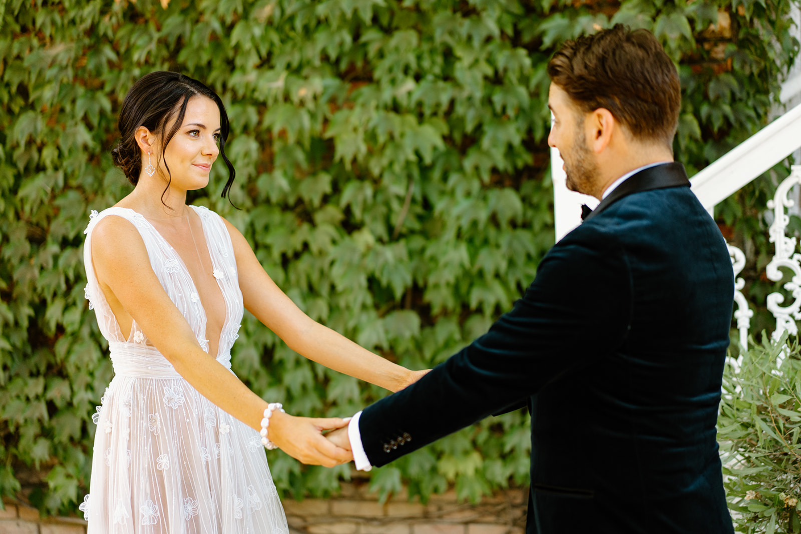 bride and groom first look at wedding at 1880 Union Hotel in Los Alamos, Ca photography by Cobblestone