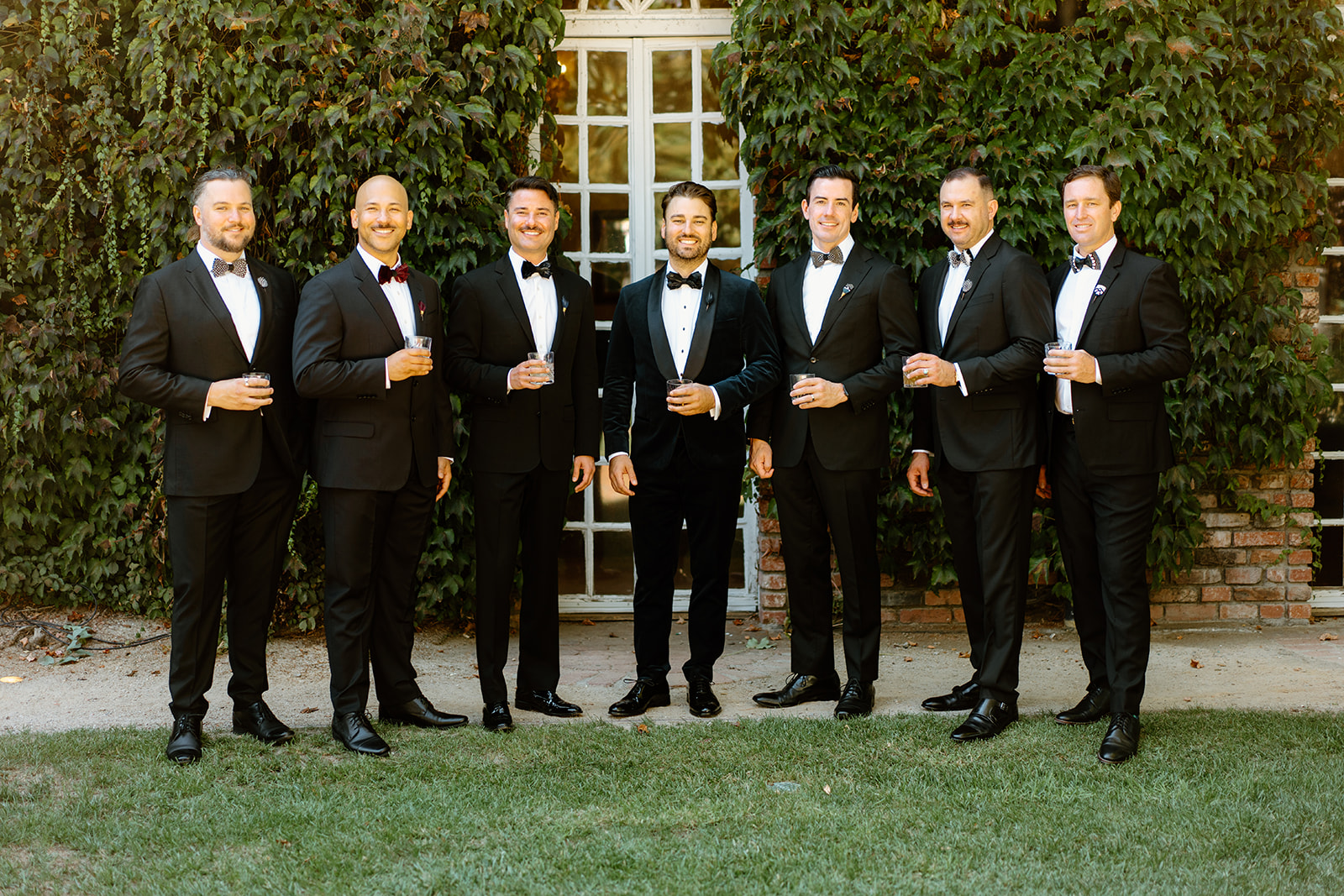 groomsmen laugh at wedding at 1880 Union Hotel in Los Alamos, Ca photography by Cobblestone