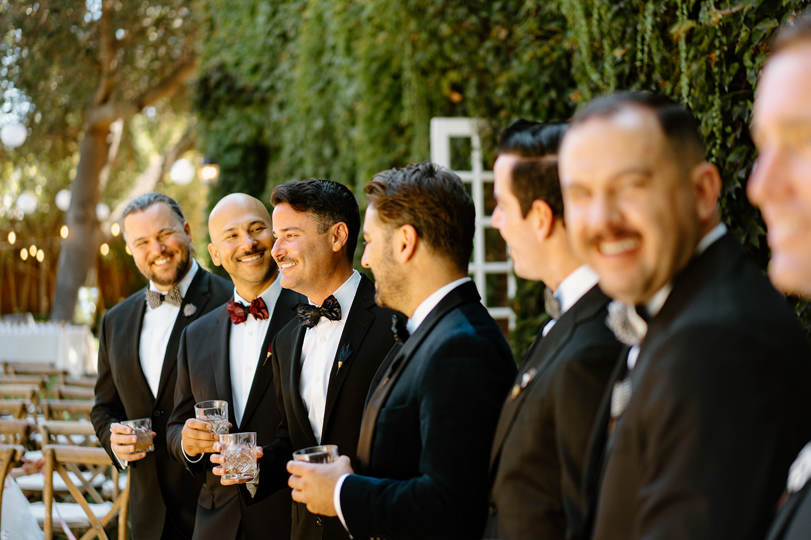 groomsmen laugh at wedding at 1880 Union Hotel in Los Alamos, Ca photography by Cobblestone