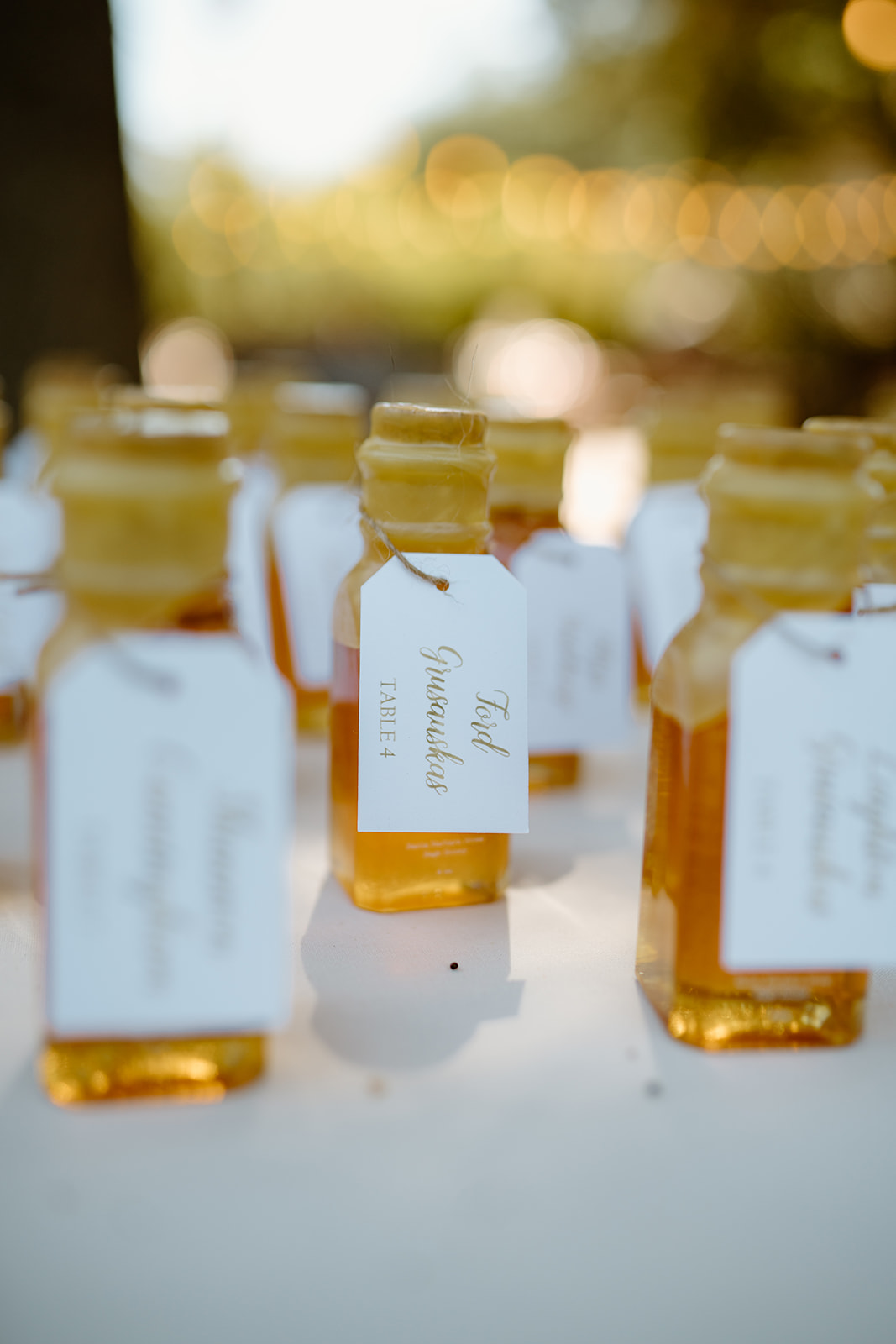 honey thank you gifts at wedding at 1880 Union Hotel in Los Alamos, Ca photography by Cobblestone