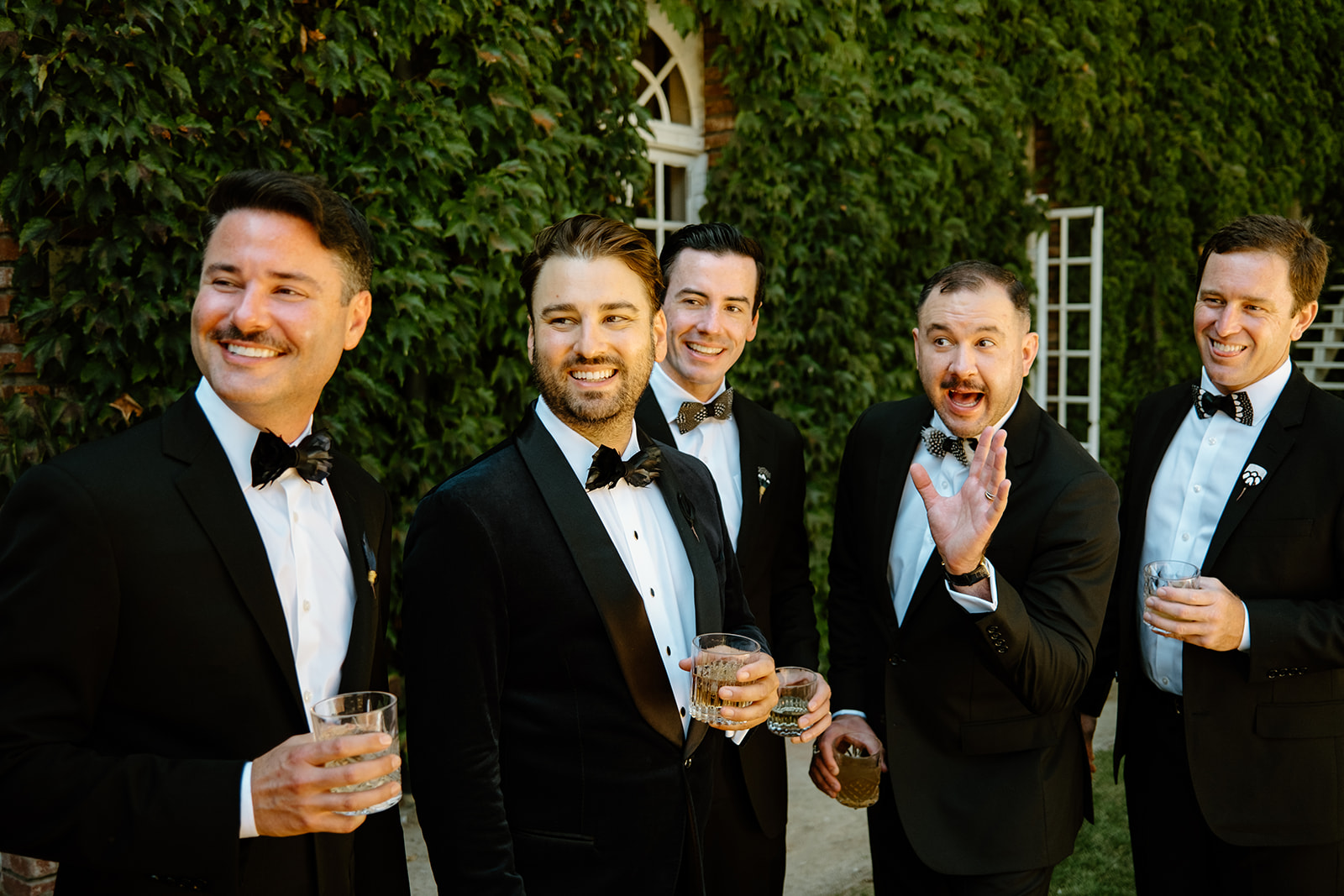 groomsmen laugh at wedding at 1880 Union Hotel in Los Alamos, Ca photography by Cobblestone