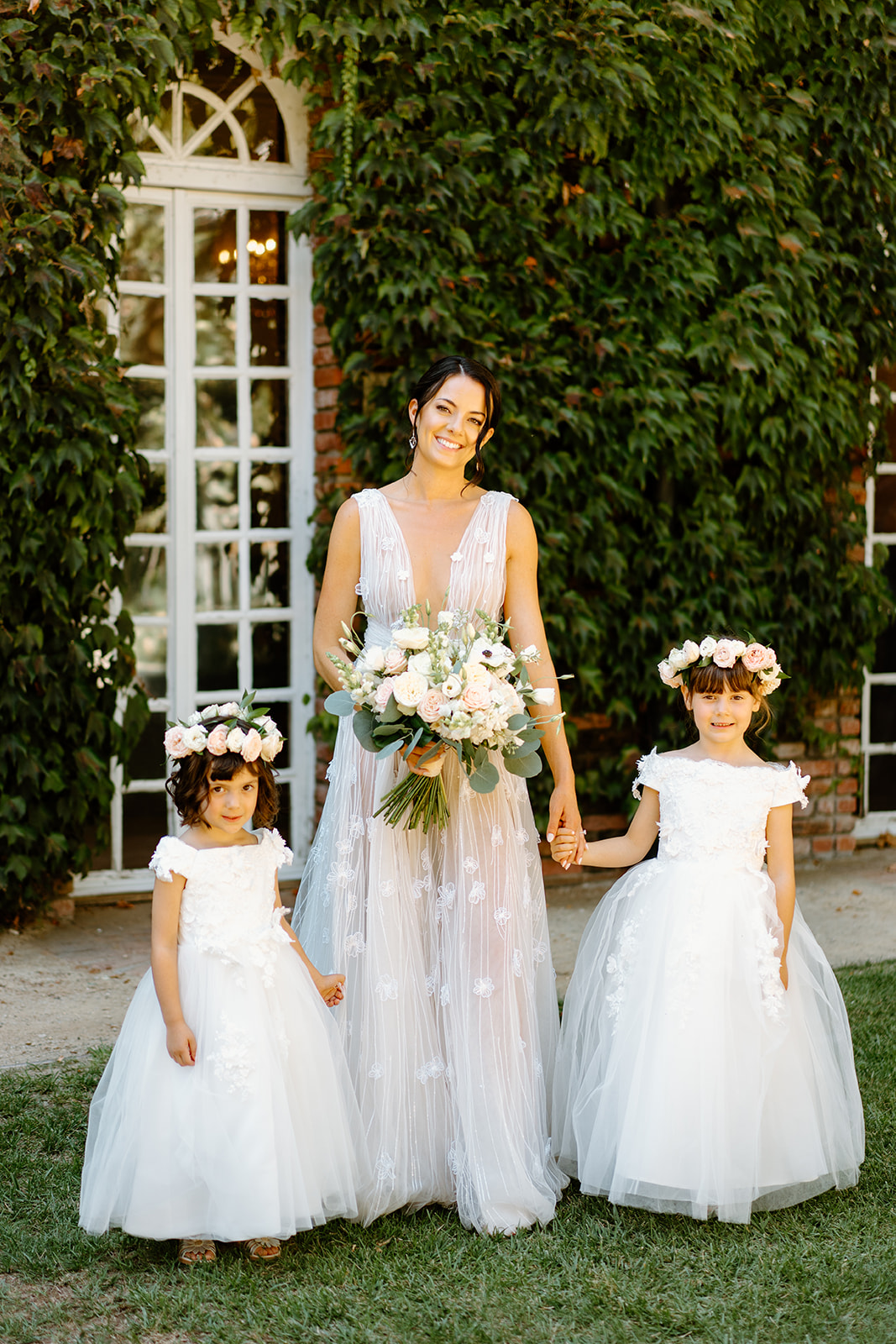 bride with flower girls at wedding at 1880 Union Hotel in Los Alamos, Ca photography by Cobblestone