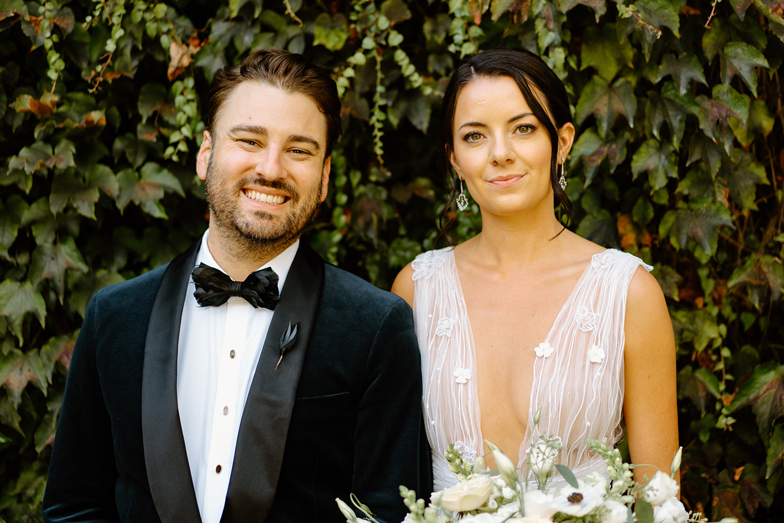 bride and groom pose after wedding at 1880 Union Hotel in Los Alamos, Ca photography by Cobblestone