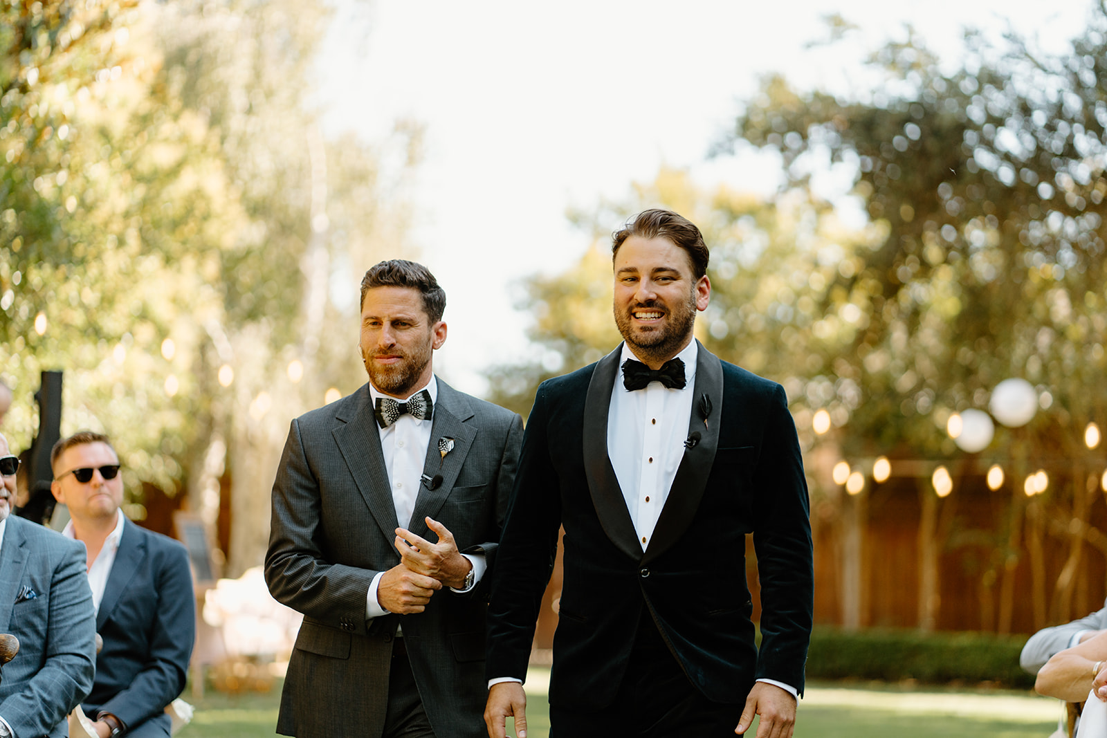 groom walks down isle at 1880 Union Hotel in Los Alamos, Ca photography by Cobblestone