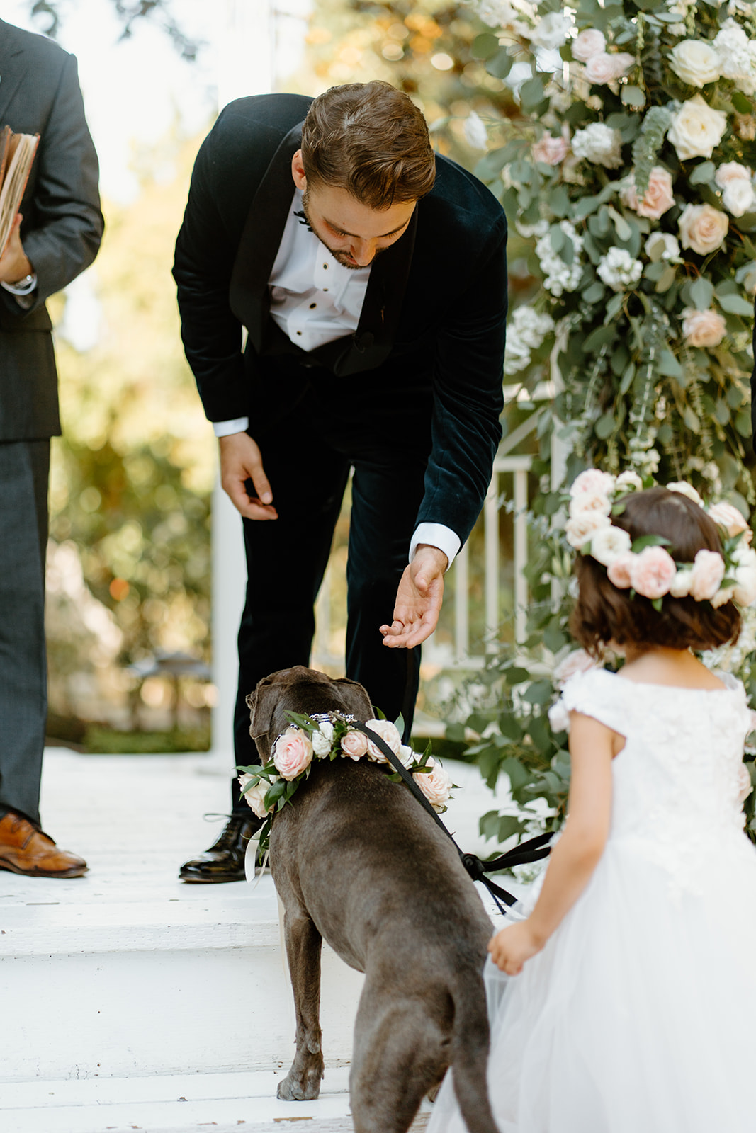 dog walks down isle with flower girl at 1880 Union Hotel in Los Alamos, Ca photography by Cobblestone