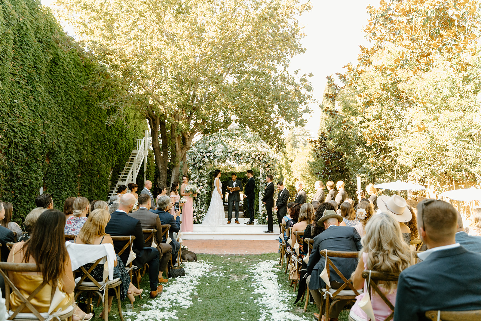 bride and groom at ceremony at 1880 Union Hotel in Los Alamos, Ca photography by Cobblestone