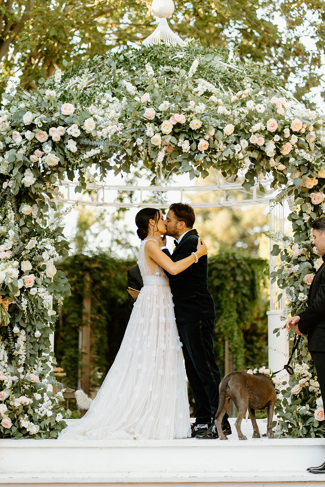 bride and groom kiss at wedding at 1880 Union Hotel in Los Alamos, Ca photography by Cobblestone