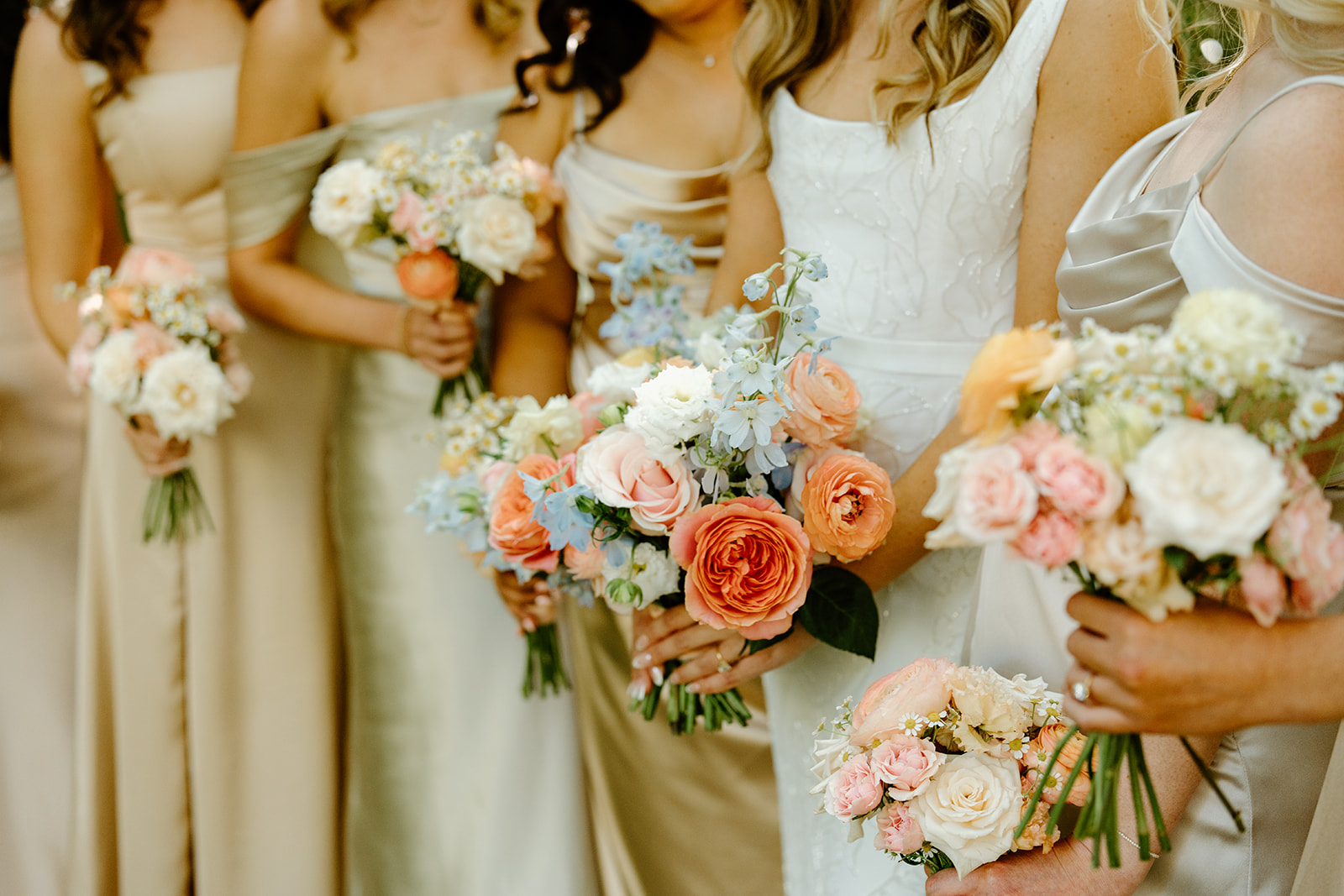 bridesmaids florals at wedding at Oceanside California, photography by Cobblestone Weddings