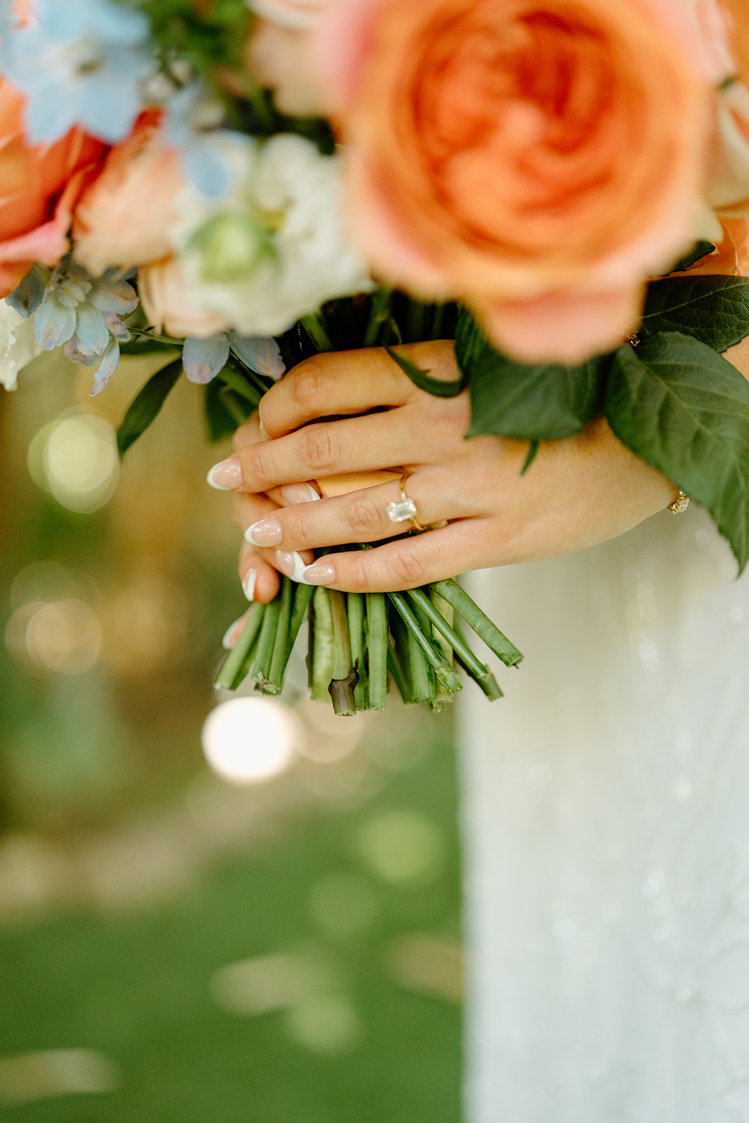 Bride with bouquet at wedding at Botanica in Oceanside California, photography by Cobblestone Weddings