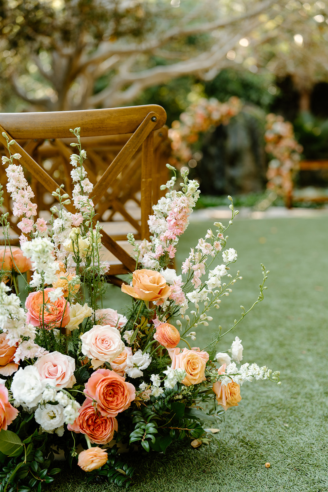 floral display at wedding at Oceanside California, photography by Cobblestone Weddings