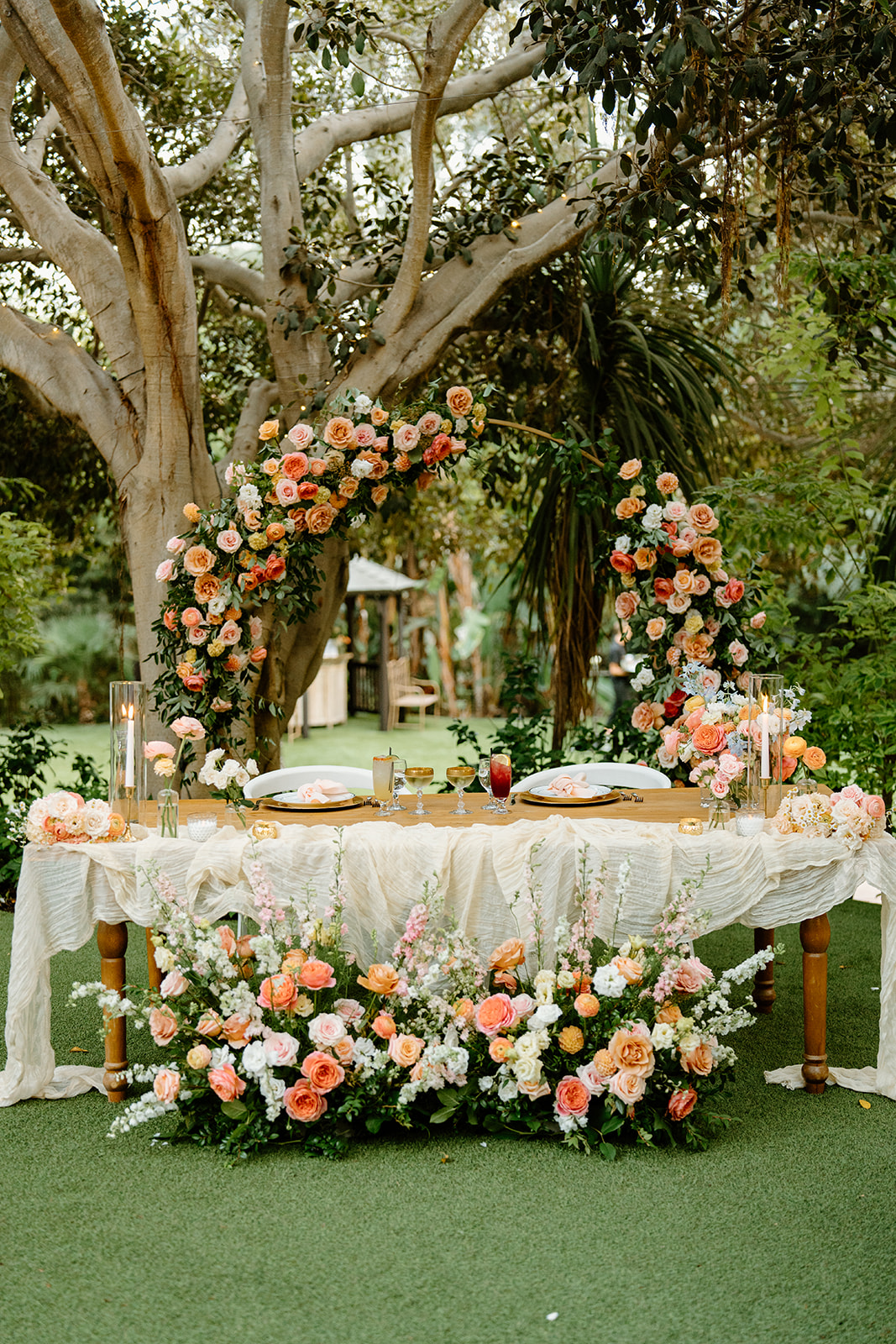 floral display at wedding at Oceanside California, photography by Cobblestone Weddings