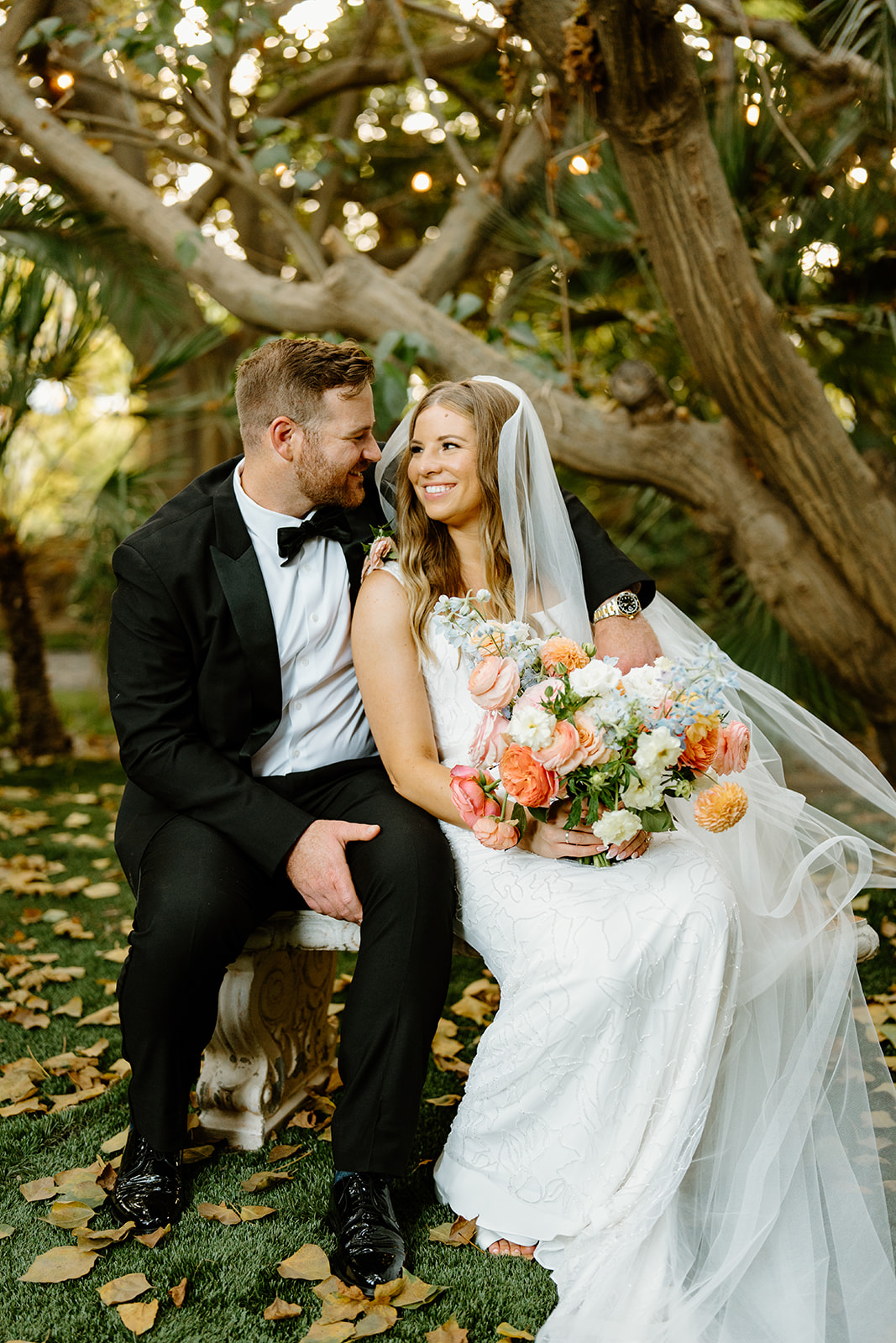bride and groom cuddle up after wedding in San Luis Obispo CA, photography by Cobblestone