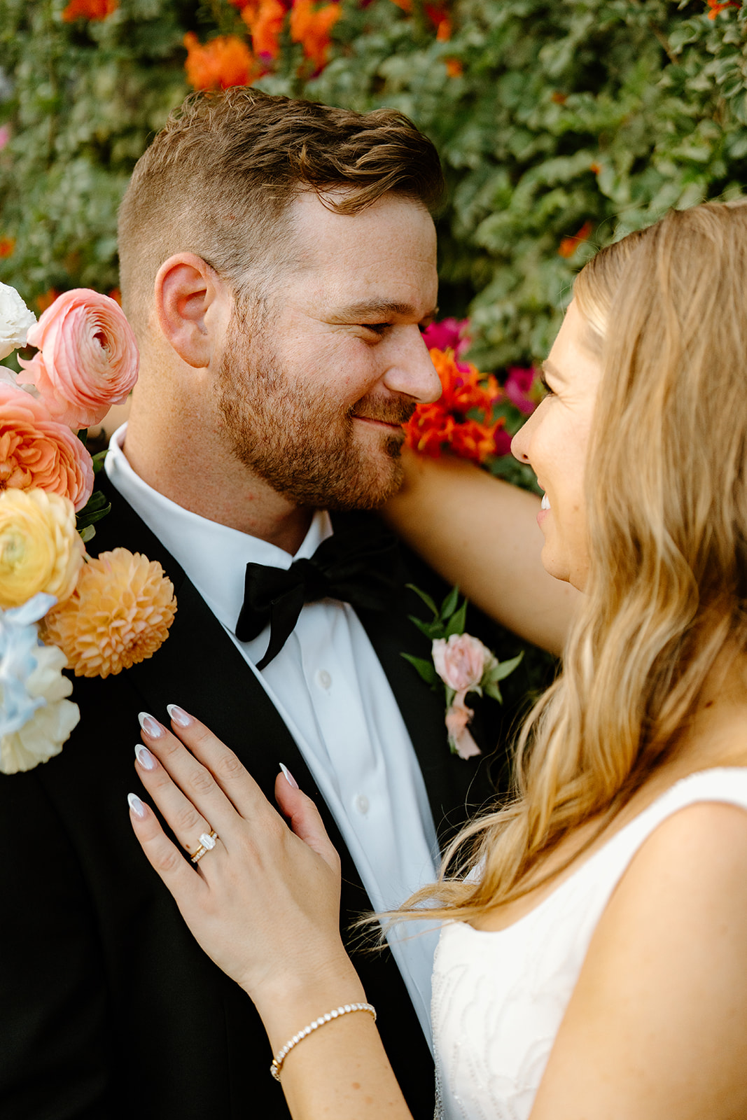 bride and groom cuddle up after wedding in San Luis Obispo CA, photography by Cobblestone