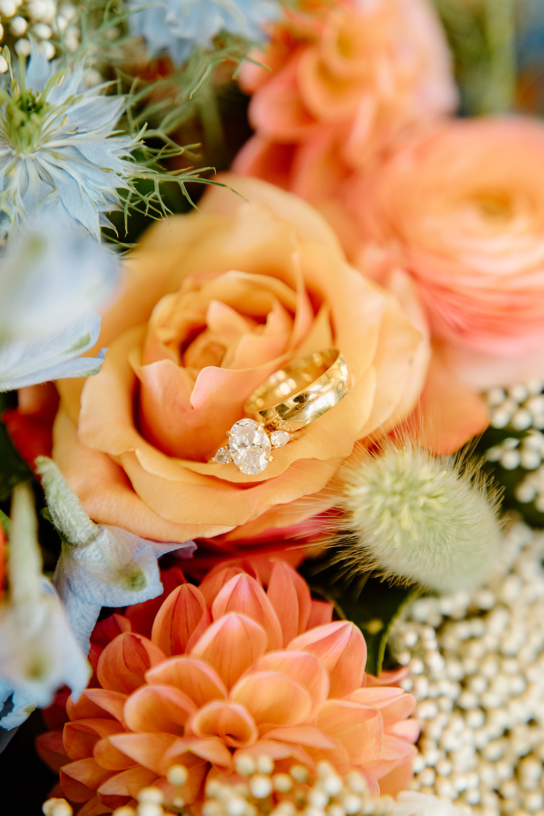 Wedding rings in florals at Higuera Ranch, San Luis Obispo CA, photography by Cobblestone
