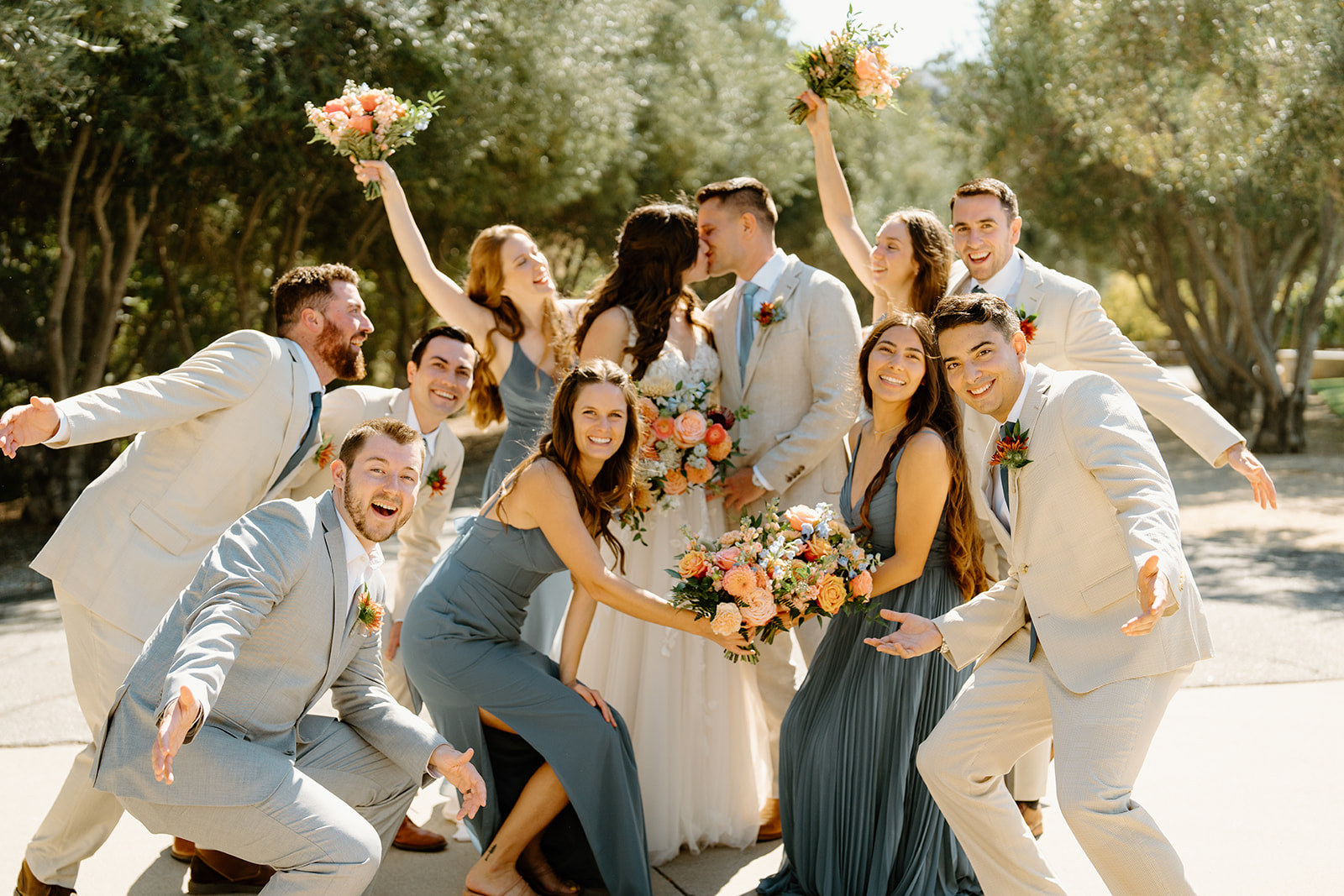 Bridal party cheers at Higuera Ranch, San Luis Obispo CA, photography by Cobblestone