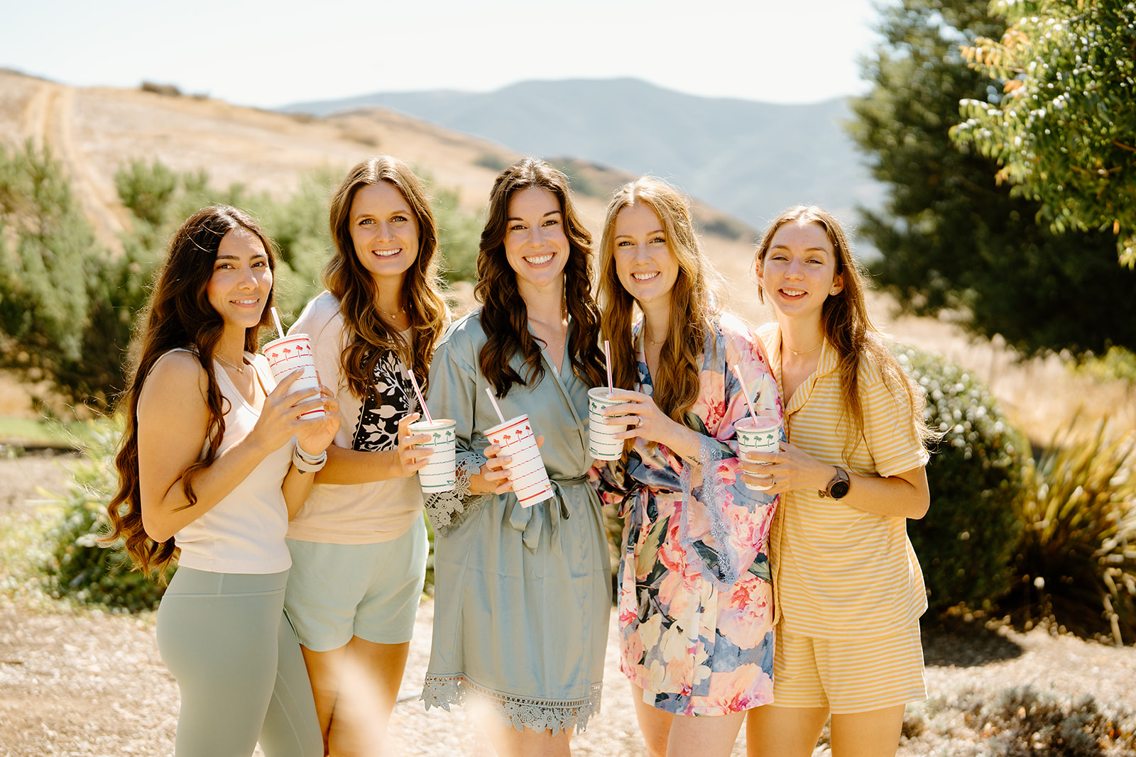 Bridesmaids holding In-And-Out drinks at Higuera Ranch, San Luis Obispo CA, photography by Cobblestone