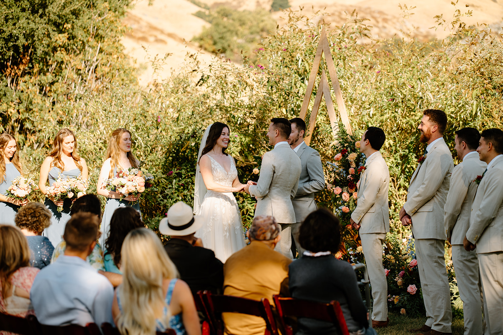 bride and groom at ceremony at wedding at Higuera Ranch, San Luis Obispo CA, photography by Cobblestone