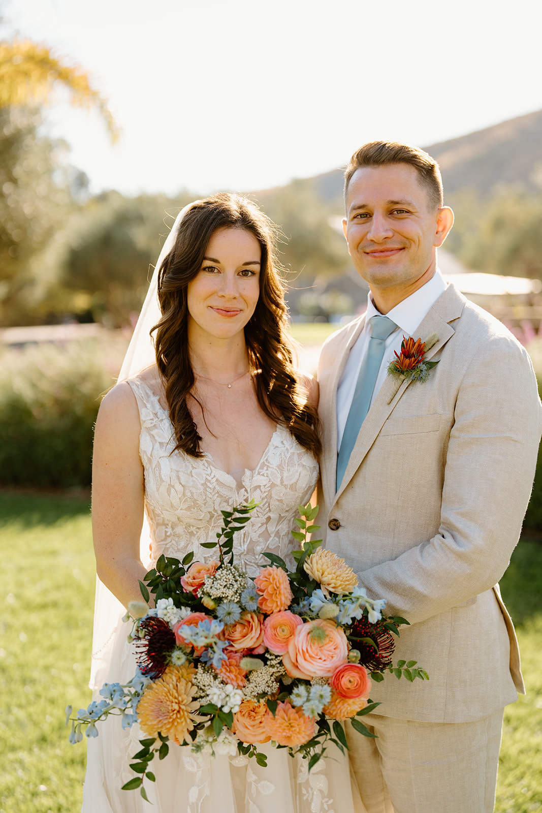 bride and groom pose at Higuera Ranch, San Luis Obispo CA, photography by Cobblestone