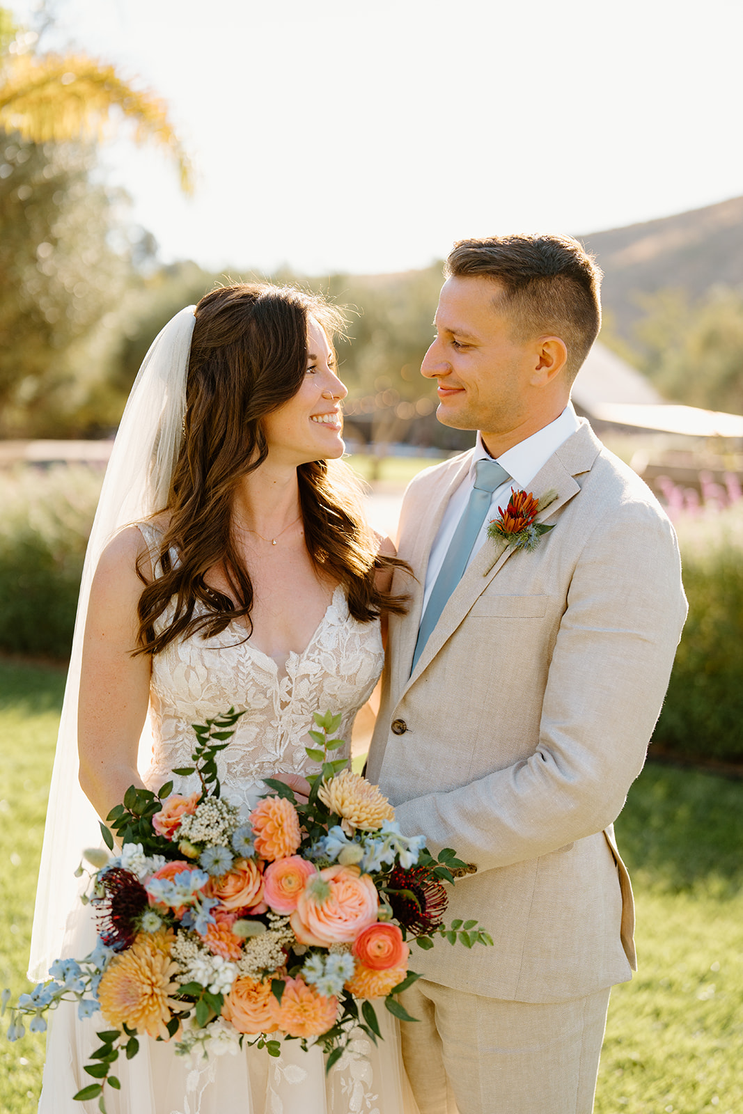 bride and groom pose at Higuera Ranch, San Luis Obispo CA, photography by Cobblestone