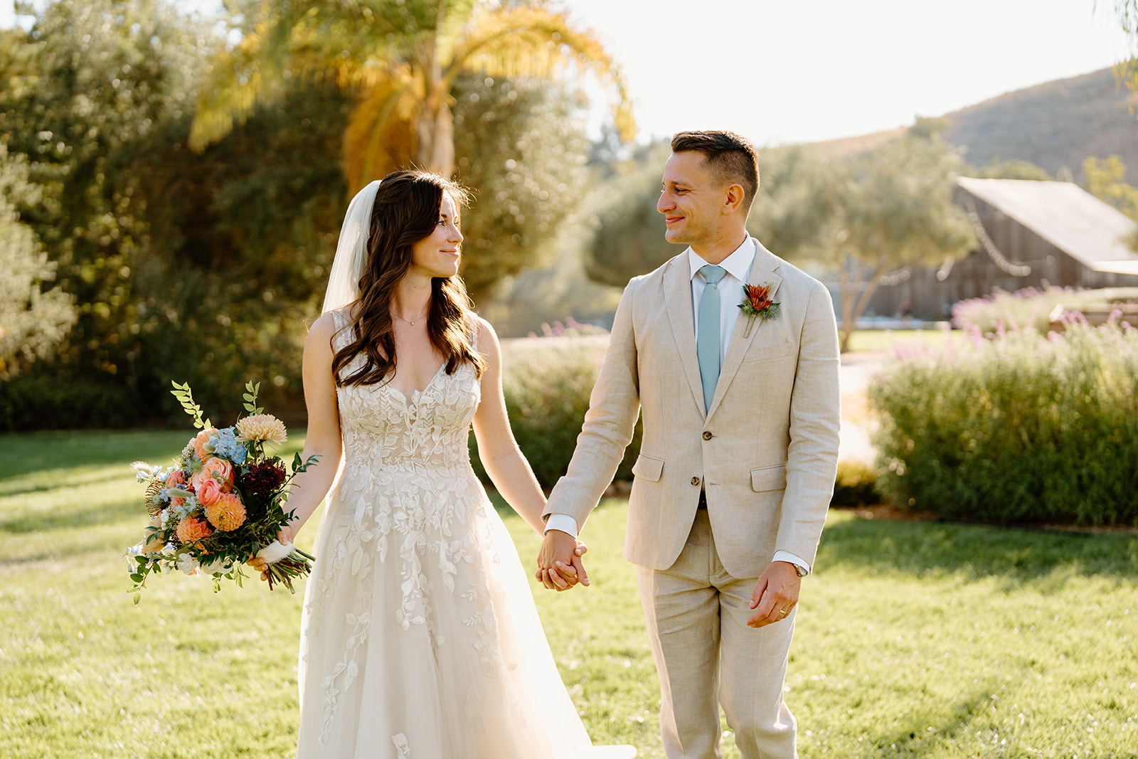 bride and groom look at eachother wedding at Higuera Ranch, San Luis Obispo CA, photography by Cobblestone