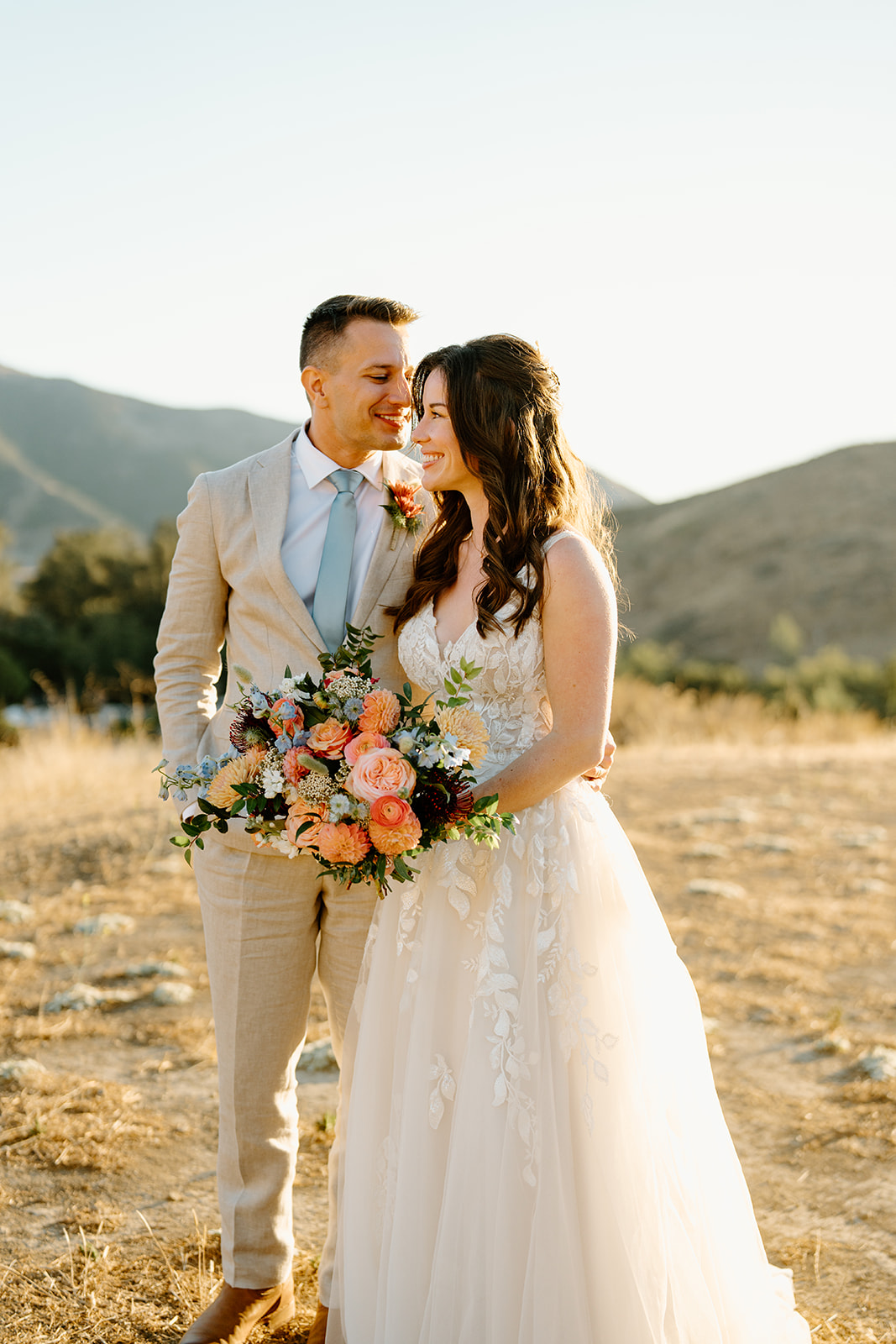 bride and groom kiss at Higuera Ranch, San Luis Obispo CA, photography by Cobblestone