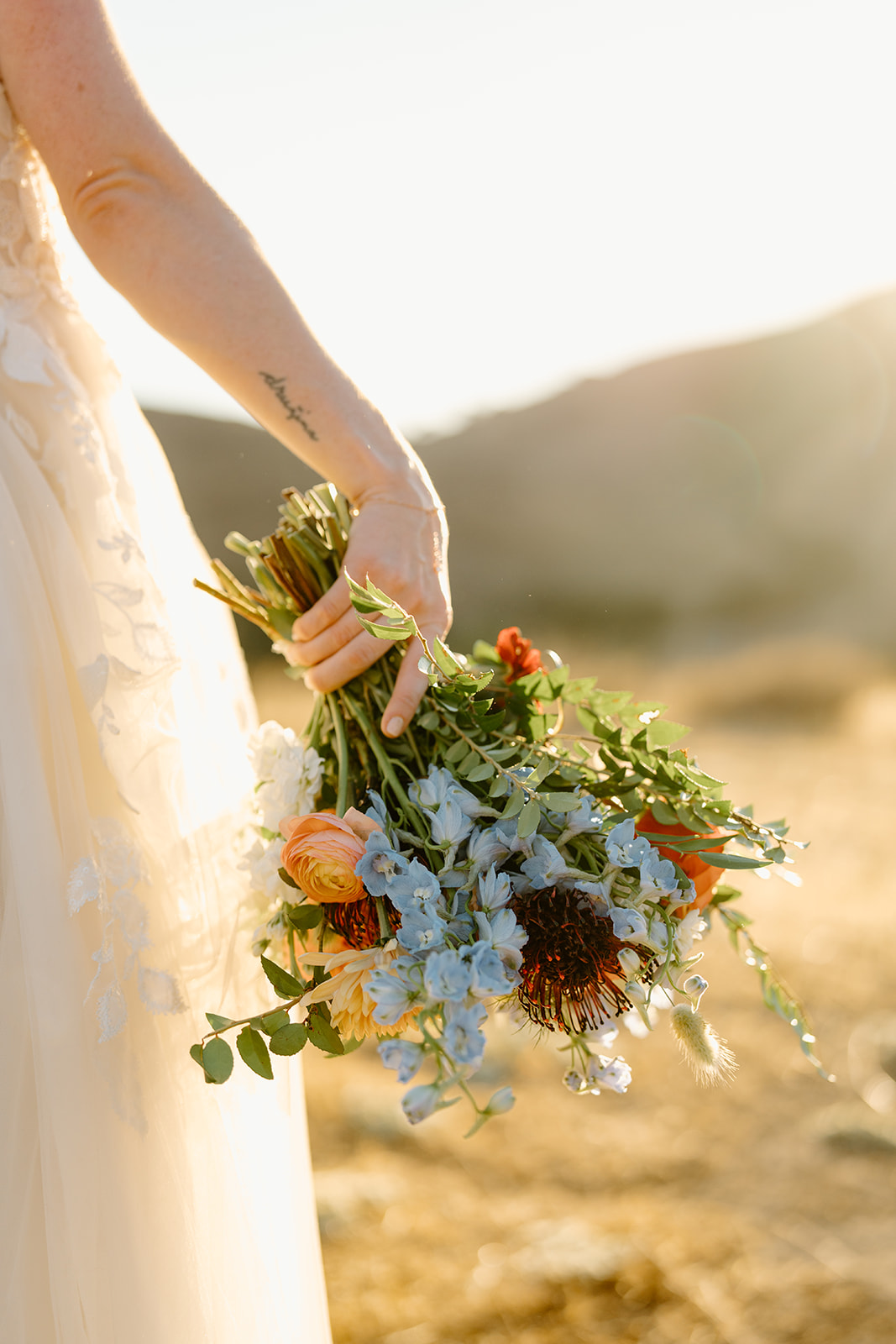 bride with bouquet at Higuera Ranch, San Luis Obispo CA, photography by Cobblestone