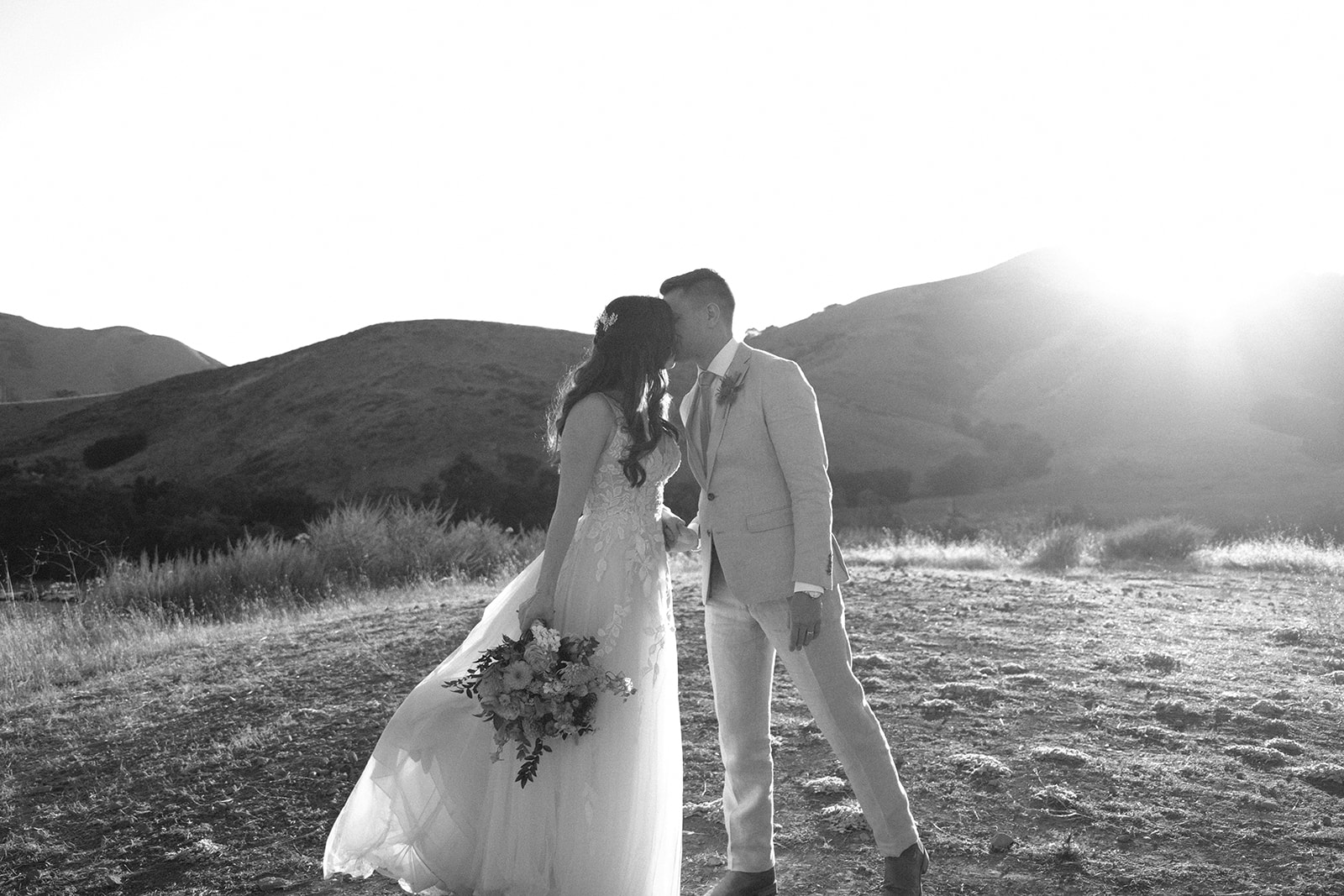 bride and groom walk together at Higuera Ranch, San Luis Obispo CA, photography by Cobblestone