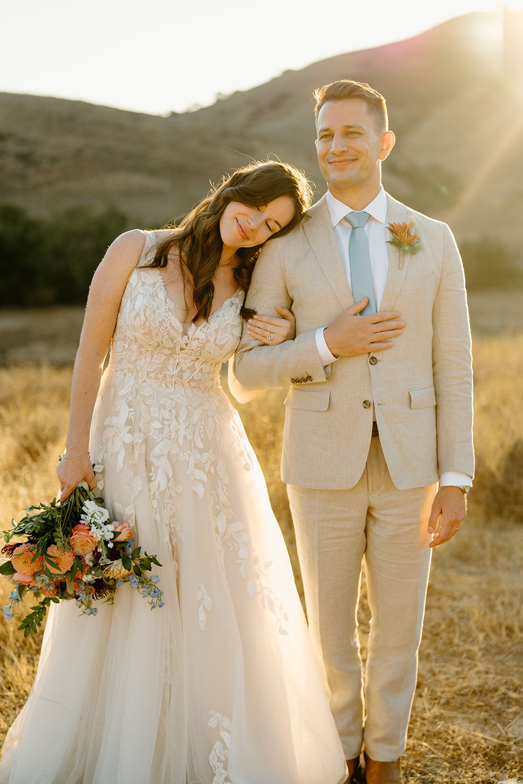 bride and groom pose at Higuera Ranch, San Luis Obispo CA, photography by Cobblestone