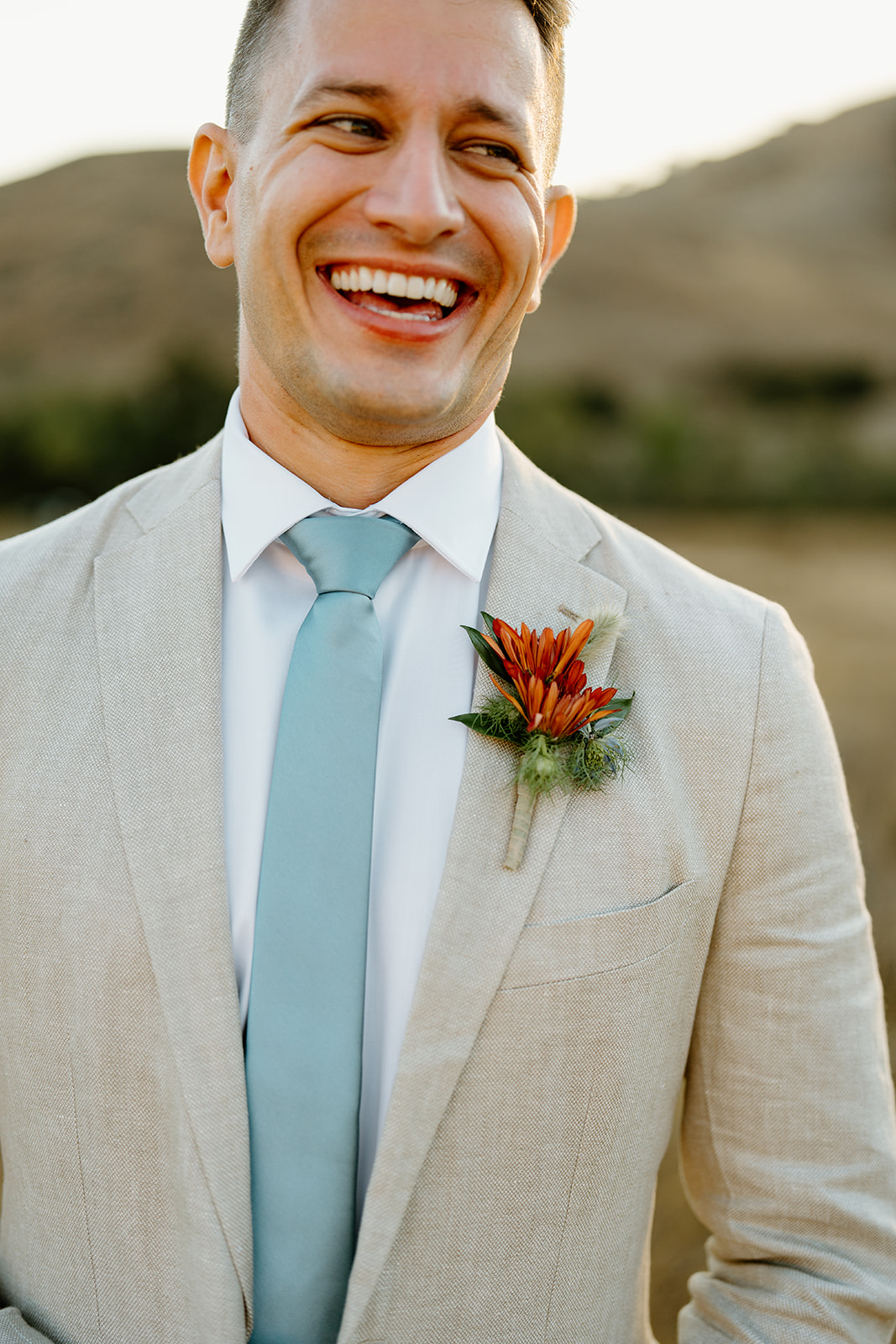 groom looking at bride at Higuera Ranch, San Luis Obispo CA, photography by Cobblestone